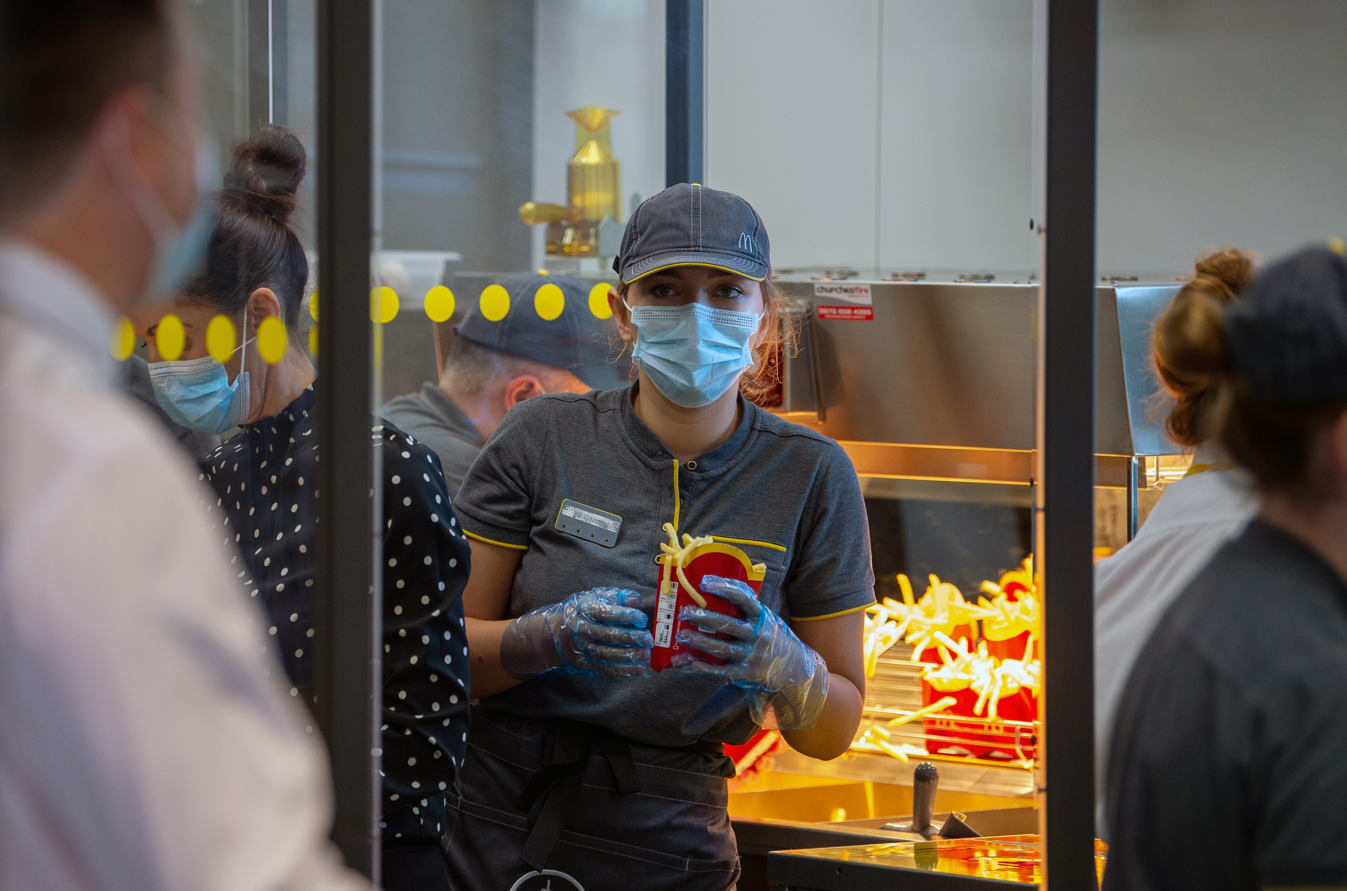 A McDonald’s worker wears a mask at its Rutland restaurant