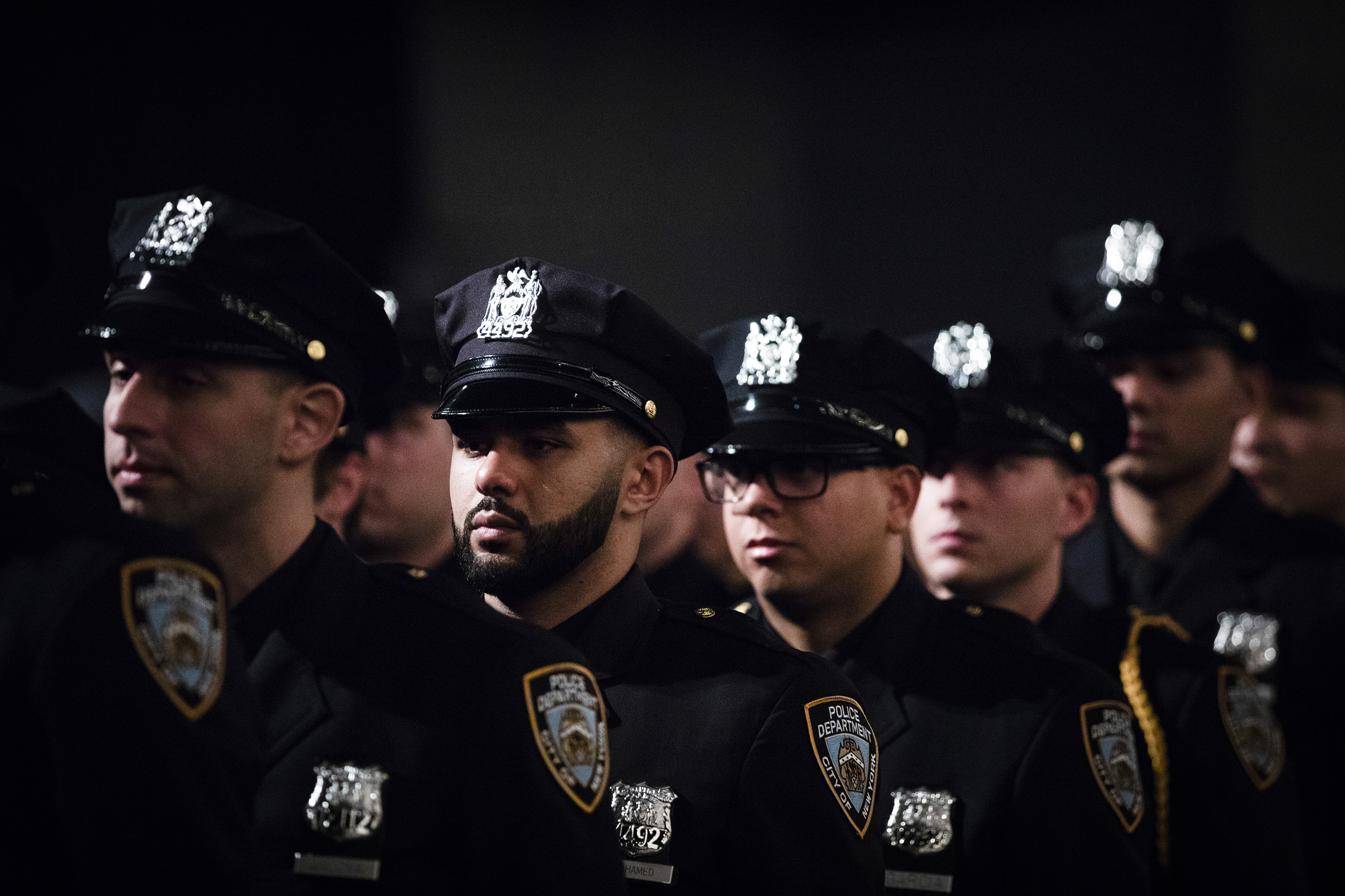 New York City Police Department officers standing in a line.