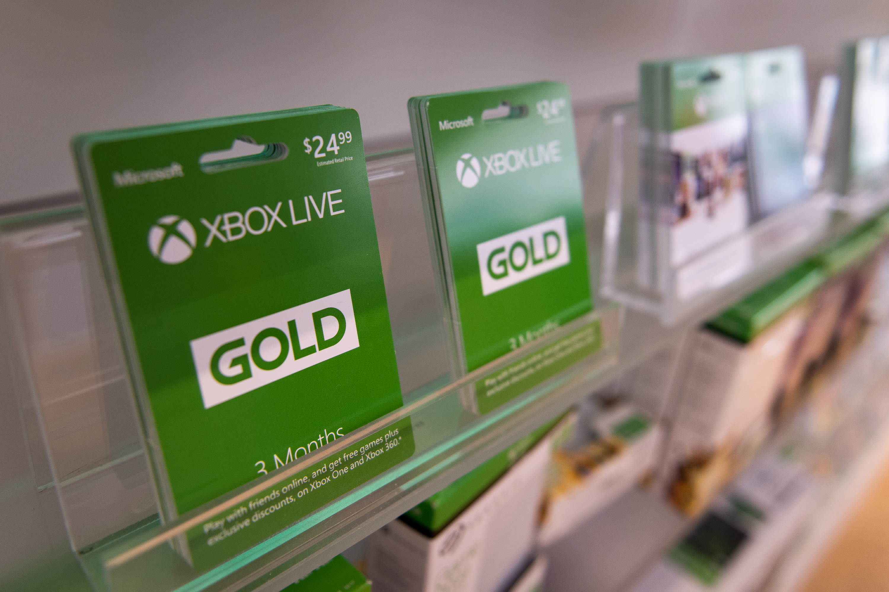 Xbox Live Gold subscription cards on a store shelf
