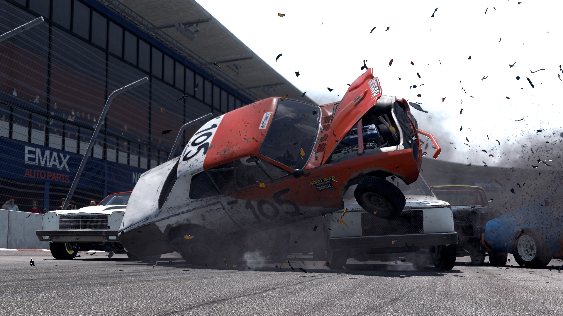 Debris sprays everywhere as one demolition racer t-bones another, turning it on its side, over the hard tarmac in Wreckfest