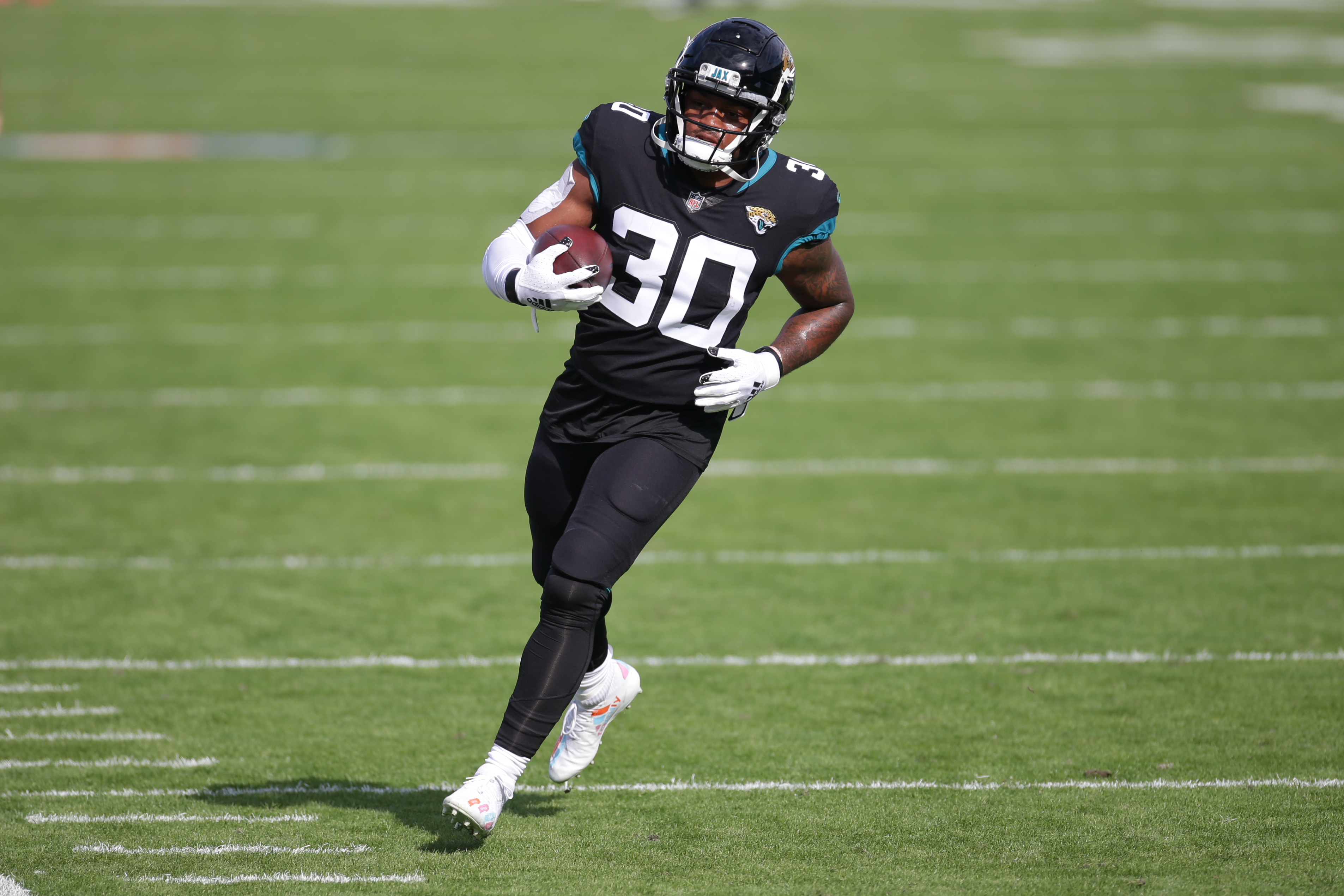 Jacksonville Jaguars Running Back James Robinson (30) during the game between the Tennessee Titans and the Jacksonville Jaguars on December 13, 2020 at TIAA Bank Field in Jacksonville, Fl.