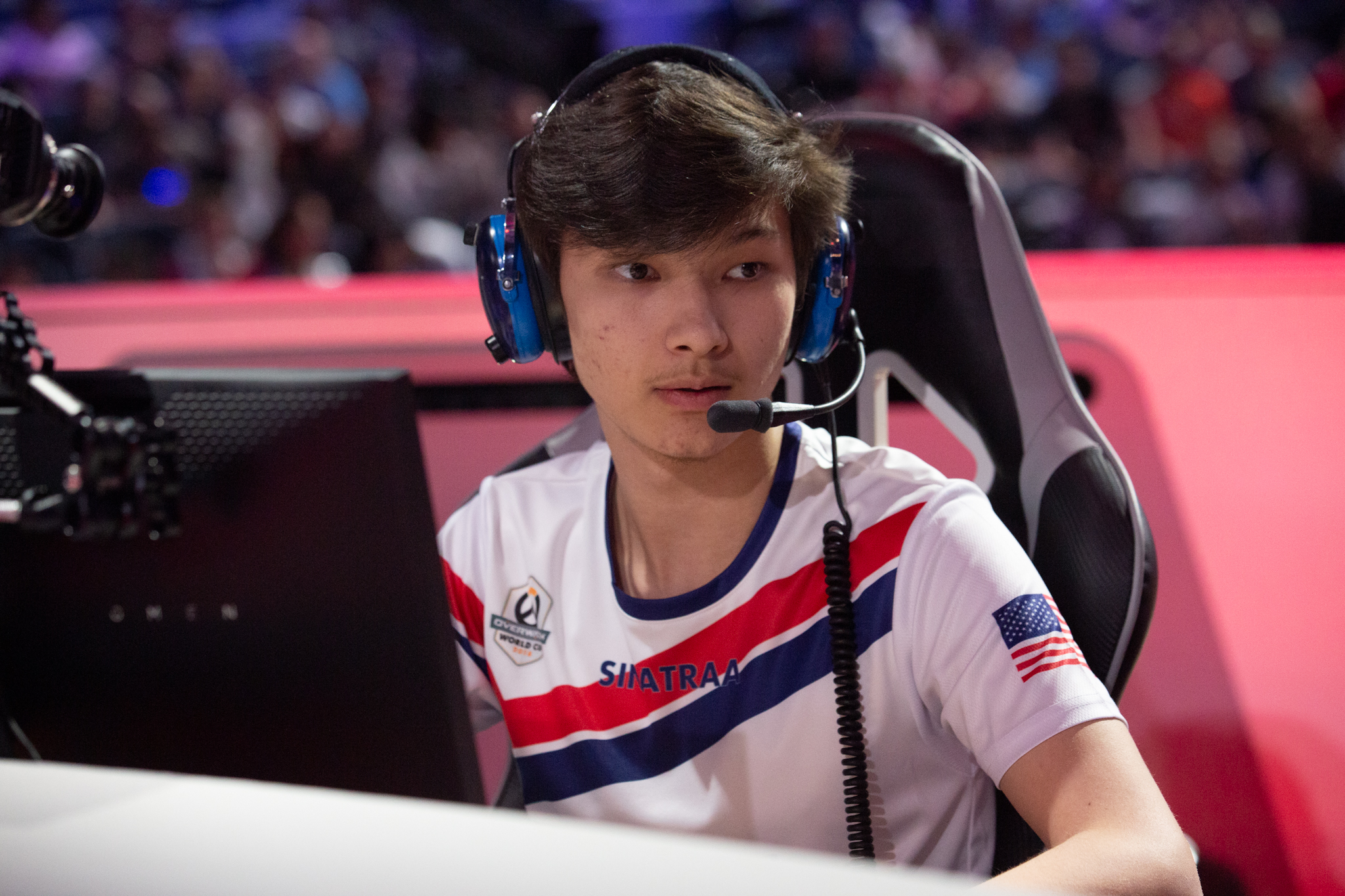 Overwatch player Jay “Sinatraa” Won at a desk wearing a headset