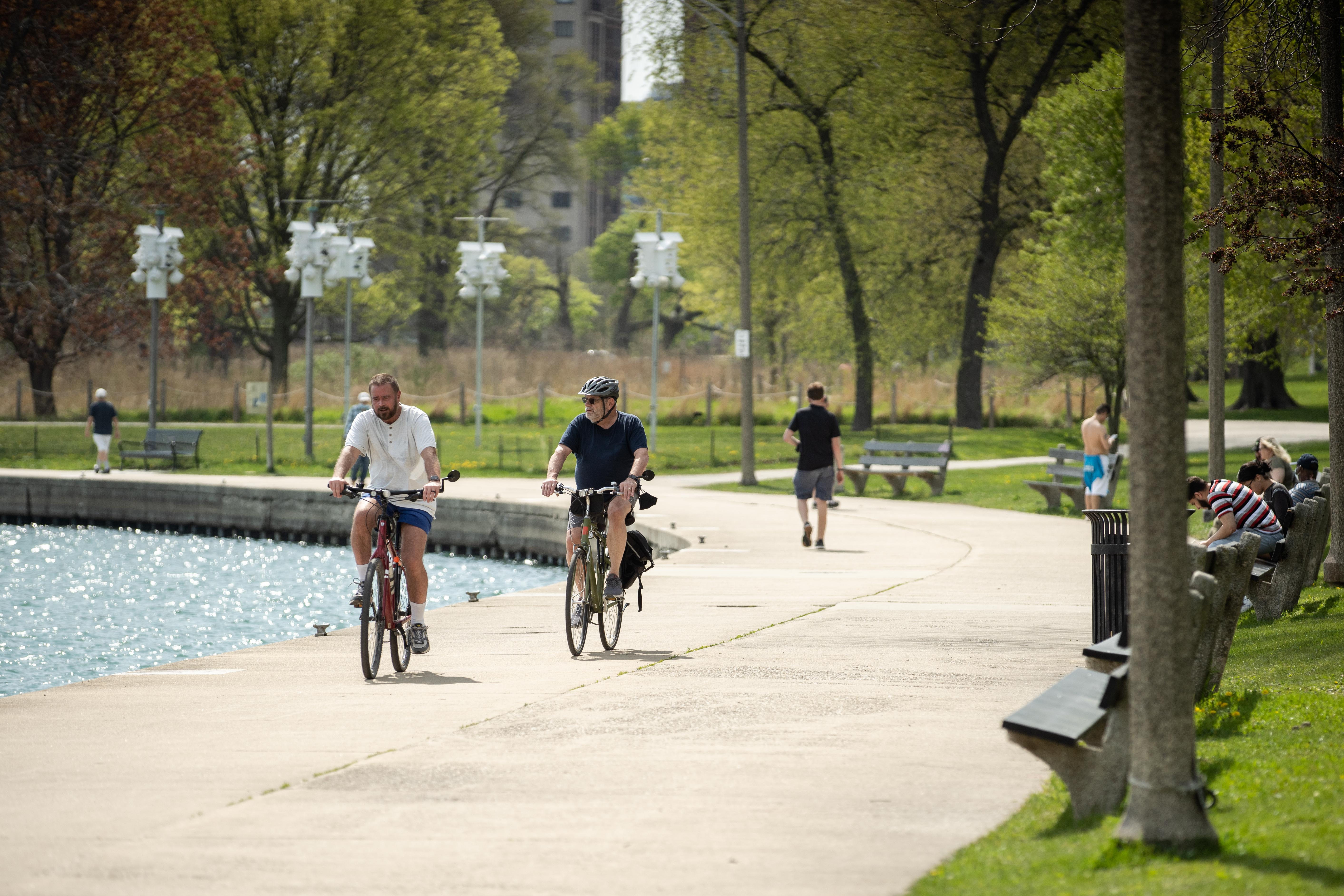 People bike around Montrose Harbor Tuesday, when temperatures topped 80 degrees. Saturday could be the city’s hottest day of the year so far. 
