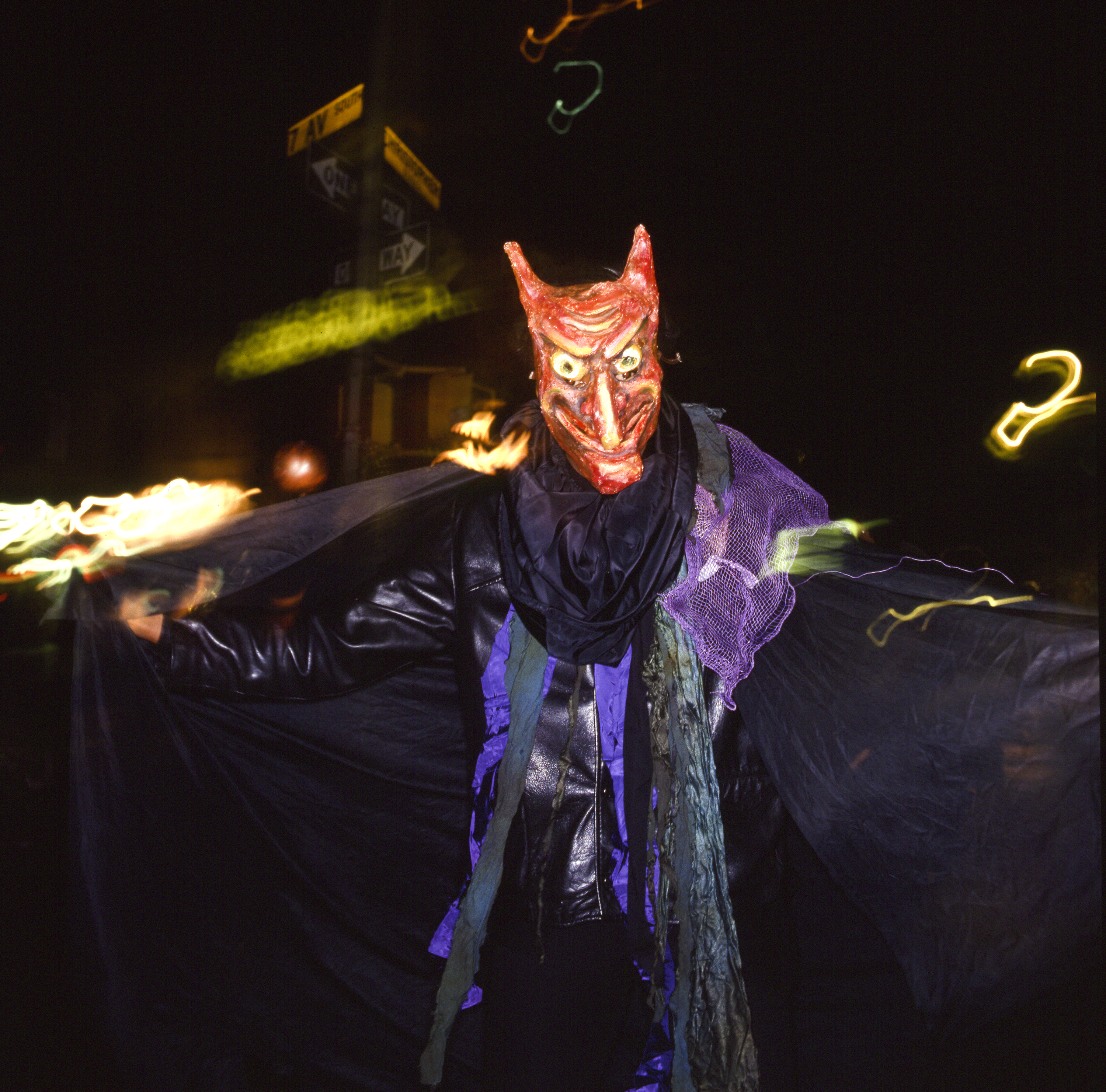A participant dressed in a devil costume during an annual Halloween parade in New York.