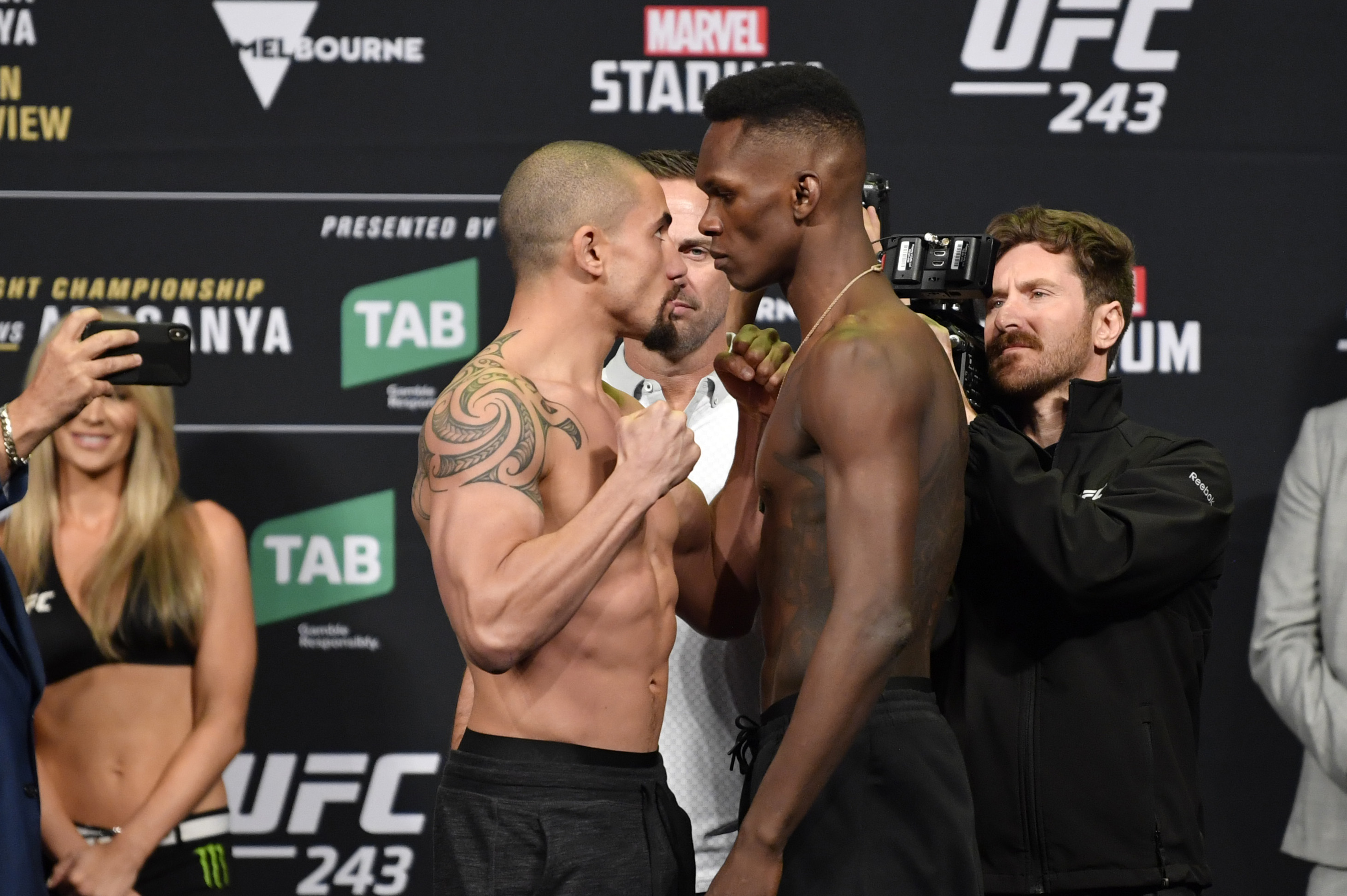 Robert Whittaker and Israel Adesanya face off ahead of their UFC 243 title fight.