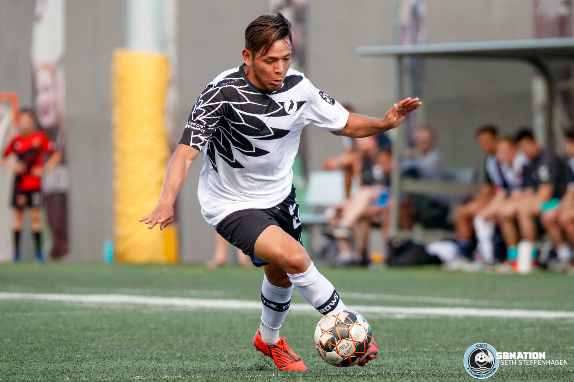 Minneapolis City SC forward Brayan Lopez dribbles the ball during the match against Med City FC at Edor Nelson Field. 