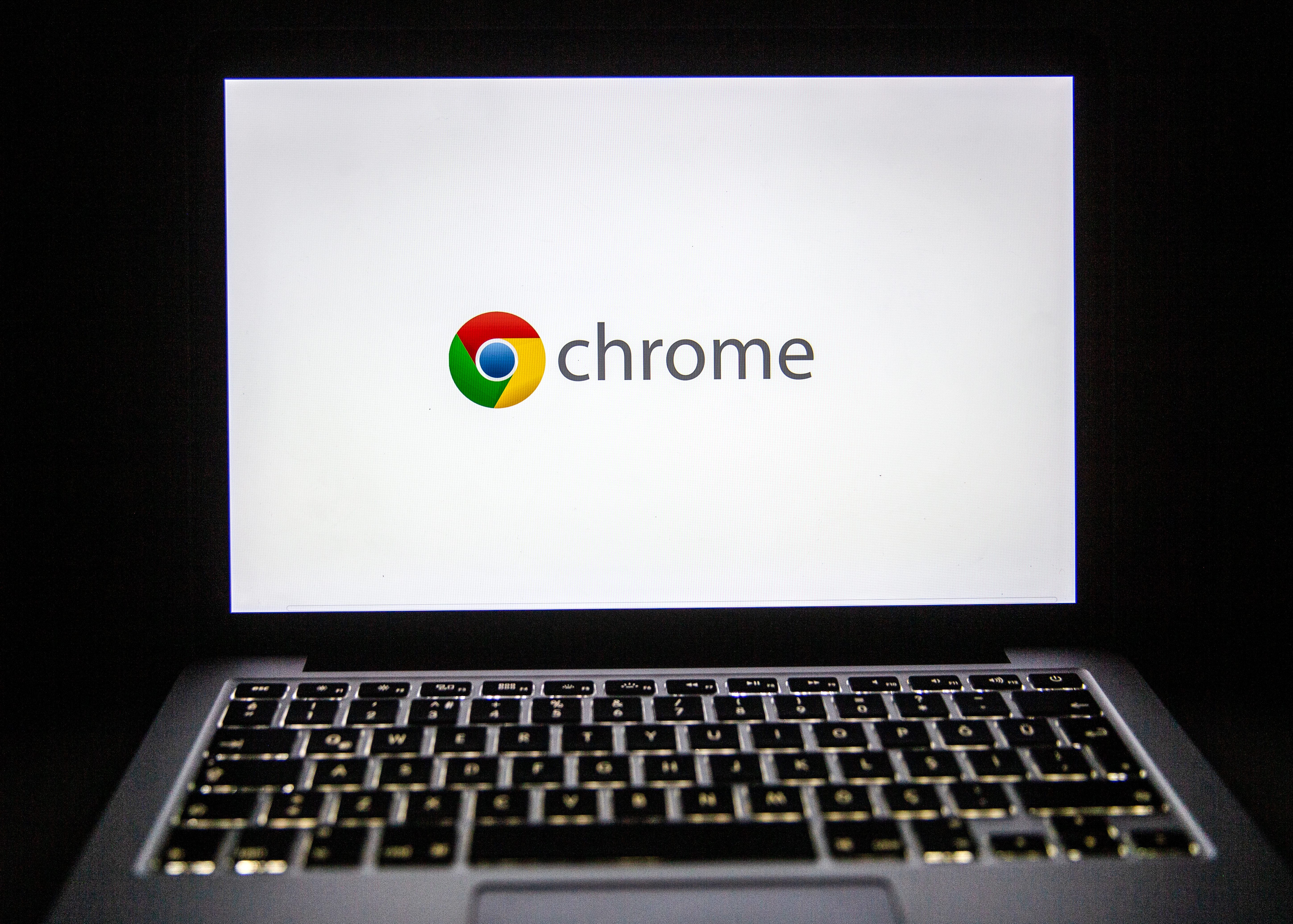 Google Chrome’s logo is seen on a laptop screen.
