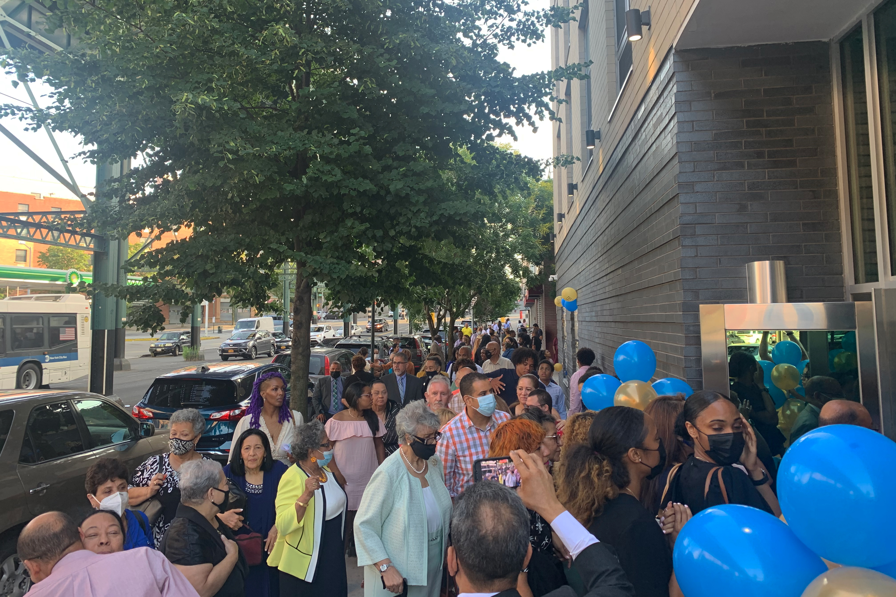 Congregants wait to enter the new home of the Bronx’ Evangelical Church Disciples of Christ, June 26, 2021.