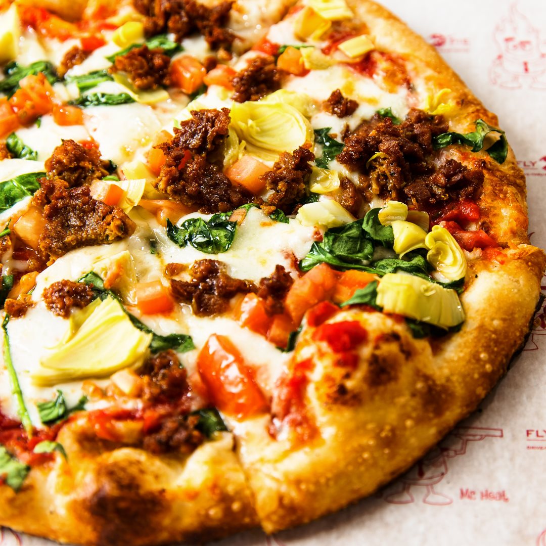 A pizza with Impossible and Beyond Meat