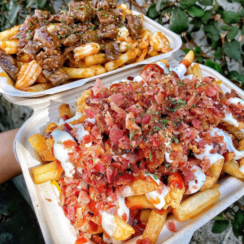 Steak and shrimp, and chicken bacon Parmesan French fry platters, on the menu at Mr. Fries Man.