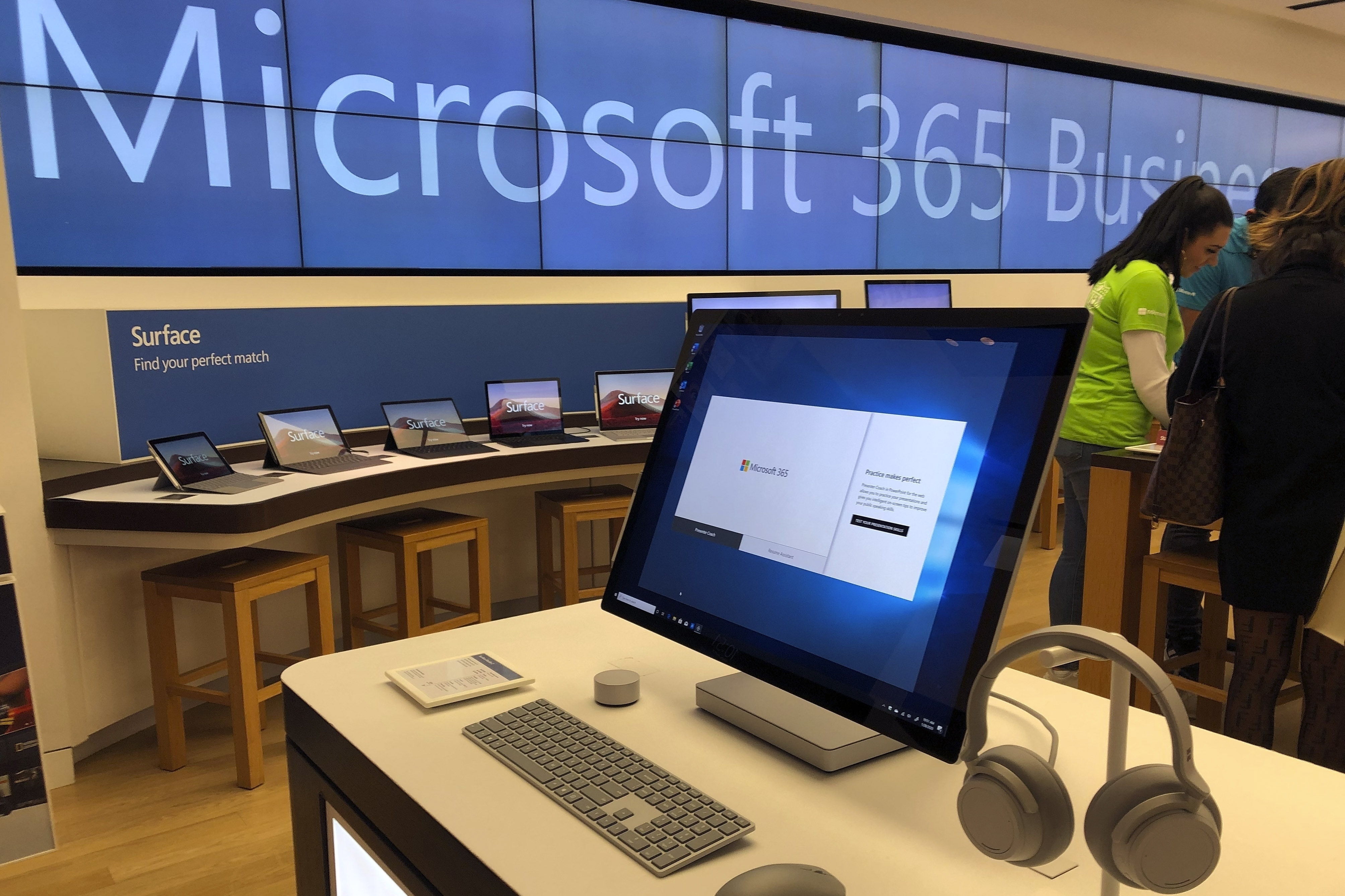 In this Jan. 28, 2020, file photo, a Microsoft computer is among items displayed at a Microsoft store in suburban Boston. The Biden administration on Monday, July 19, 2021, blamed China for a hack of Microsoft Exchange email server software that compromised tens of thousands of computers around the world earlier in the year.
