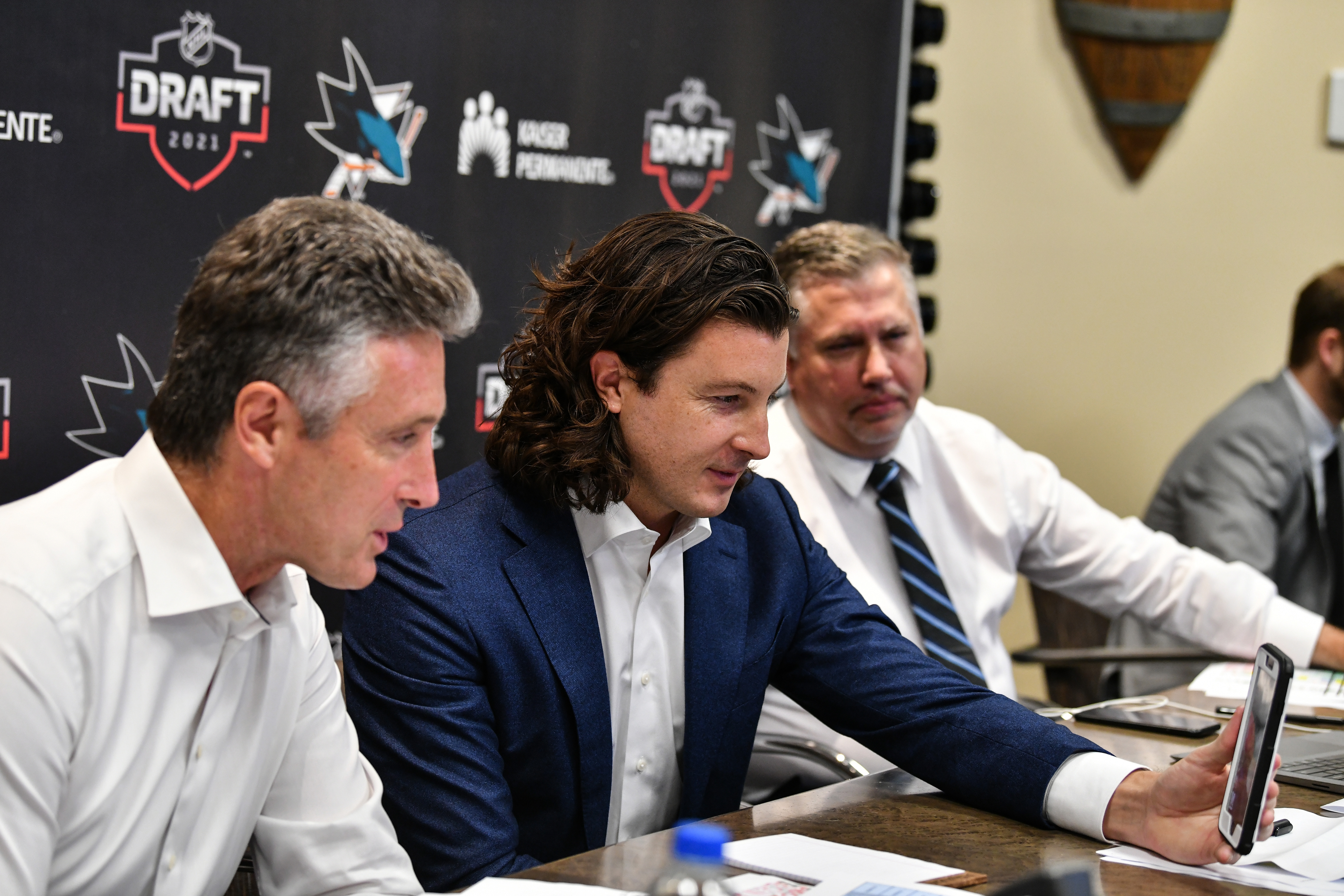 San Jose Sharks General Manager Doug Wilson and Director of Scouting Doug Wilson Jr. facetime William Eklund the seventh overall in the first round during the 2021 NHL Draft at SAP Center on July 23, 2021 in San Jose, California.