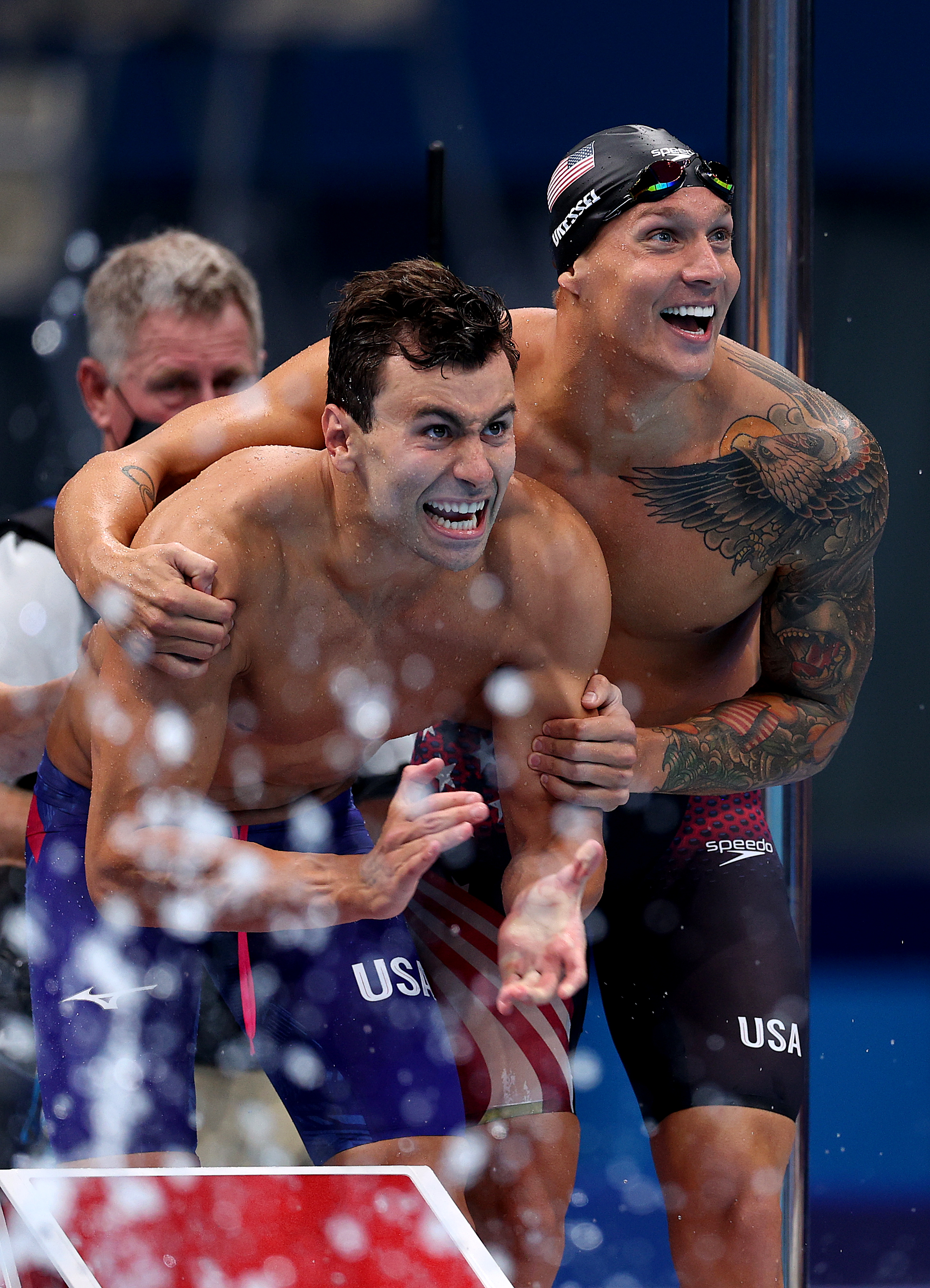 Blake Pieroni of Team United States and Caeleb Dressel of Team United States celebrate after winning the gold medal in the Men’s 4 x 100m Freestyle Relay Final on day three of the Tokyo 2020 Olympic Games at Tokyo Aquatics Centre on July 26, 2021 in Tokyo, Japan.