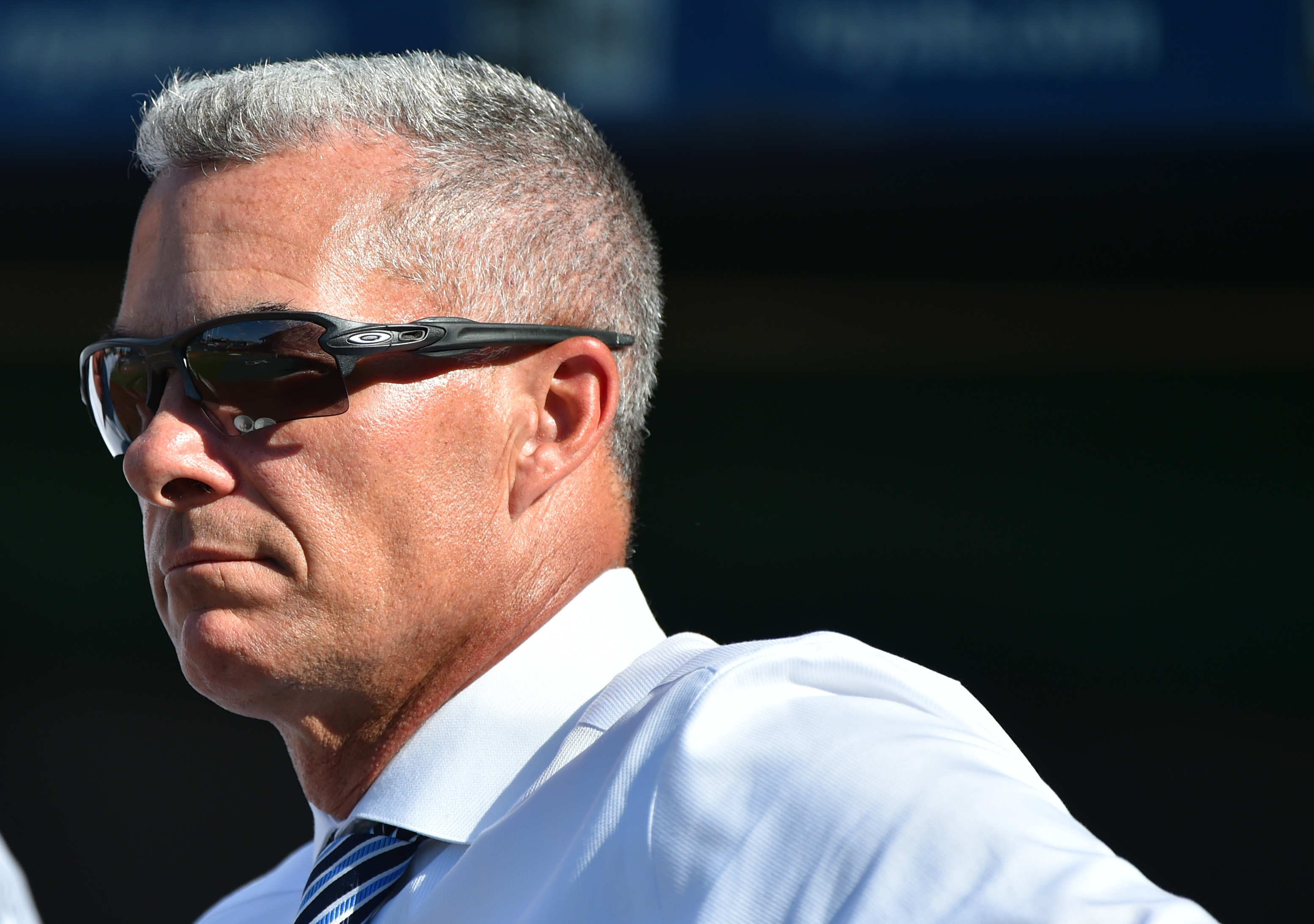 General manager Dayton Moore of the Kansas City Royals watches batting practice prior to a game against the Baltimore Orioles at Kauffman Stadium on August 30, 2019 in Kansas City, Missouri. Owner David Glass has agreed to to sell the team to a group led by Kansas City business man John Sherman for an estimated $1 billion.