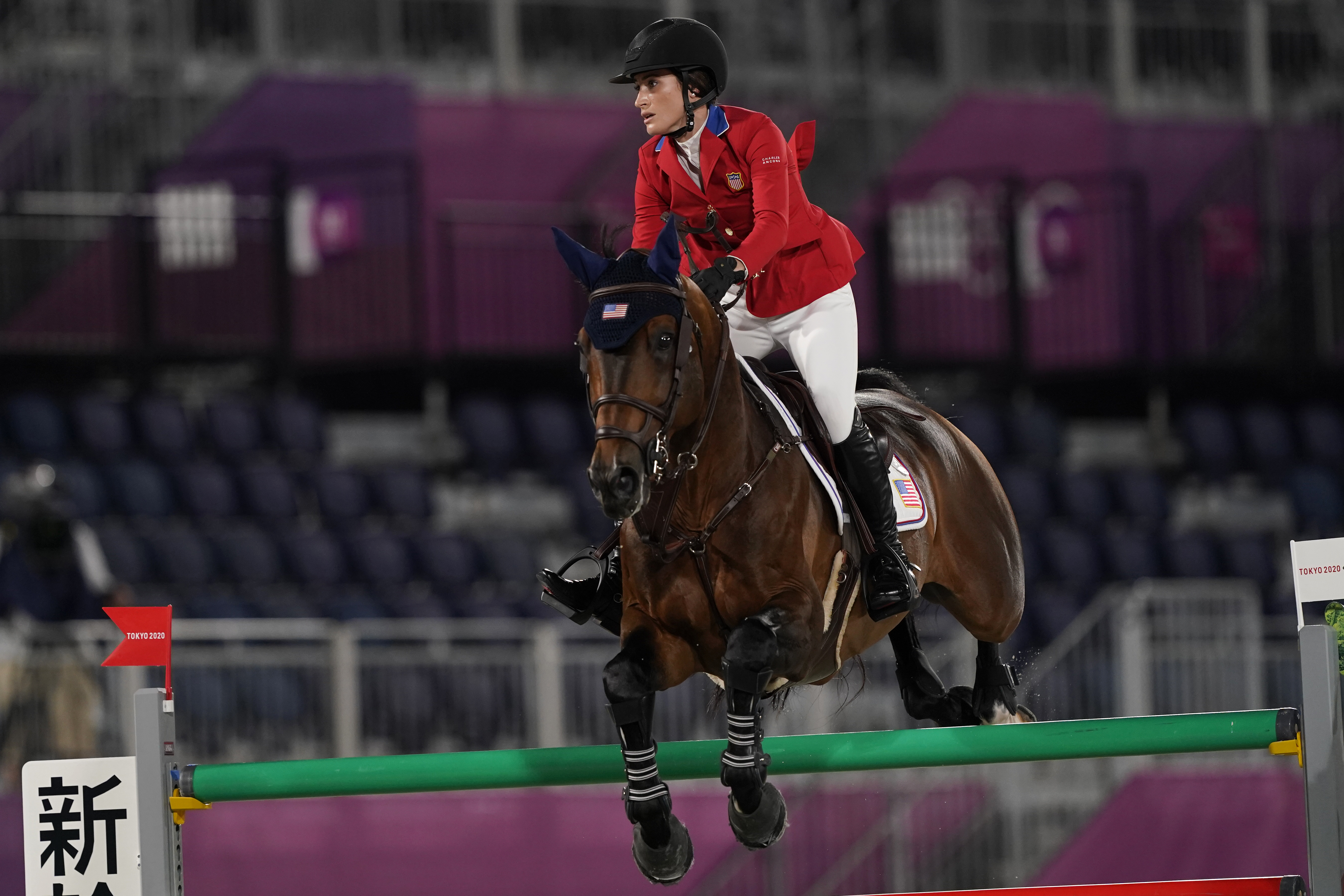 United States’ Jessica Springsteen, riding Don Juan van de Donkhoeve, competes during the equestrian jumping team qualifying at Equestrian Park in Tokyo.