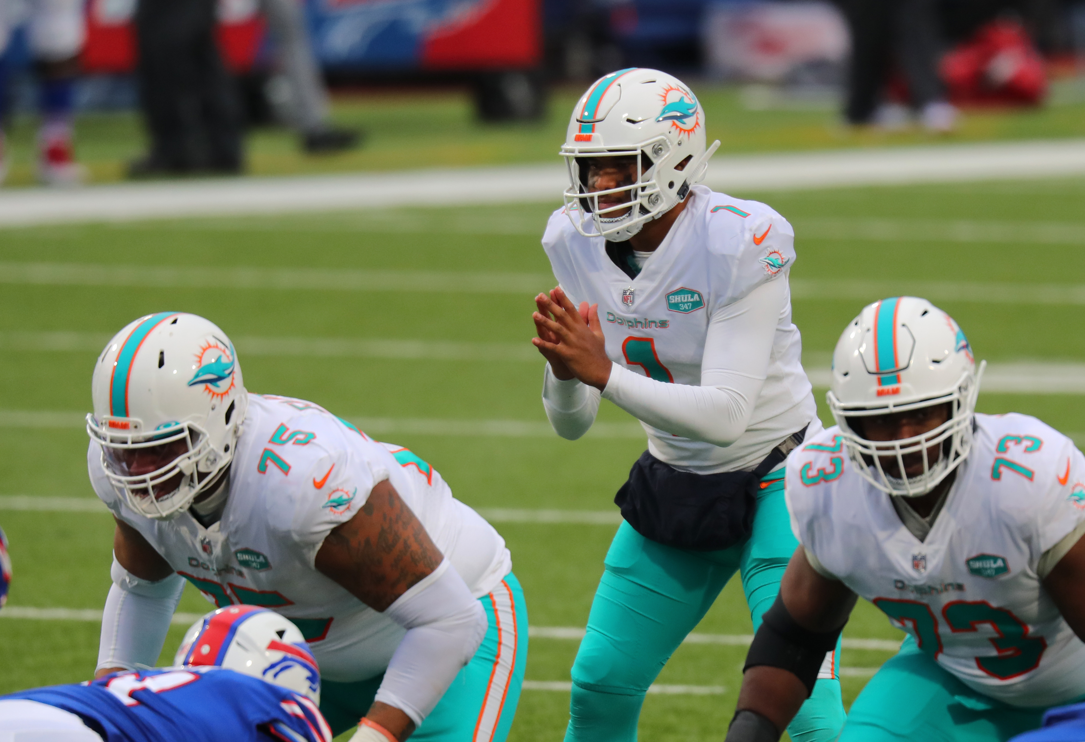 Tua Tagovailoa #1 of the Miami Dolphins waits for the snap during a game against the Buffalo Bills at Bills Stadium on January 3, 2021 in Orchard Park, New York.