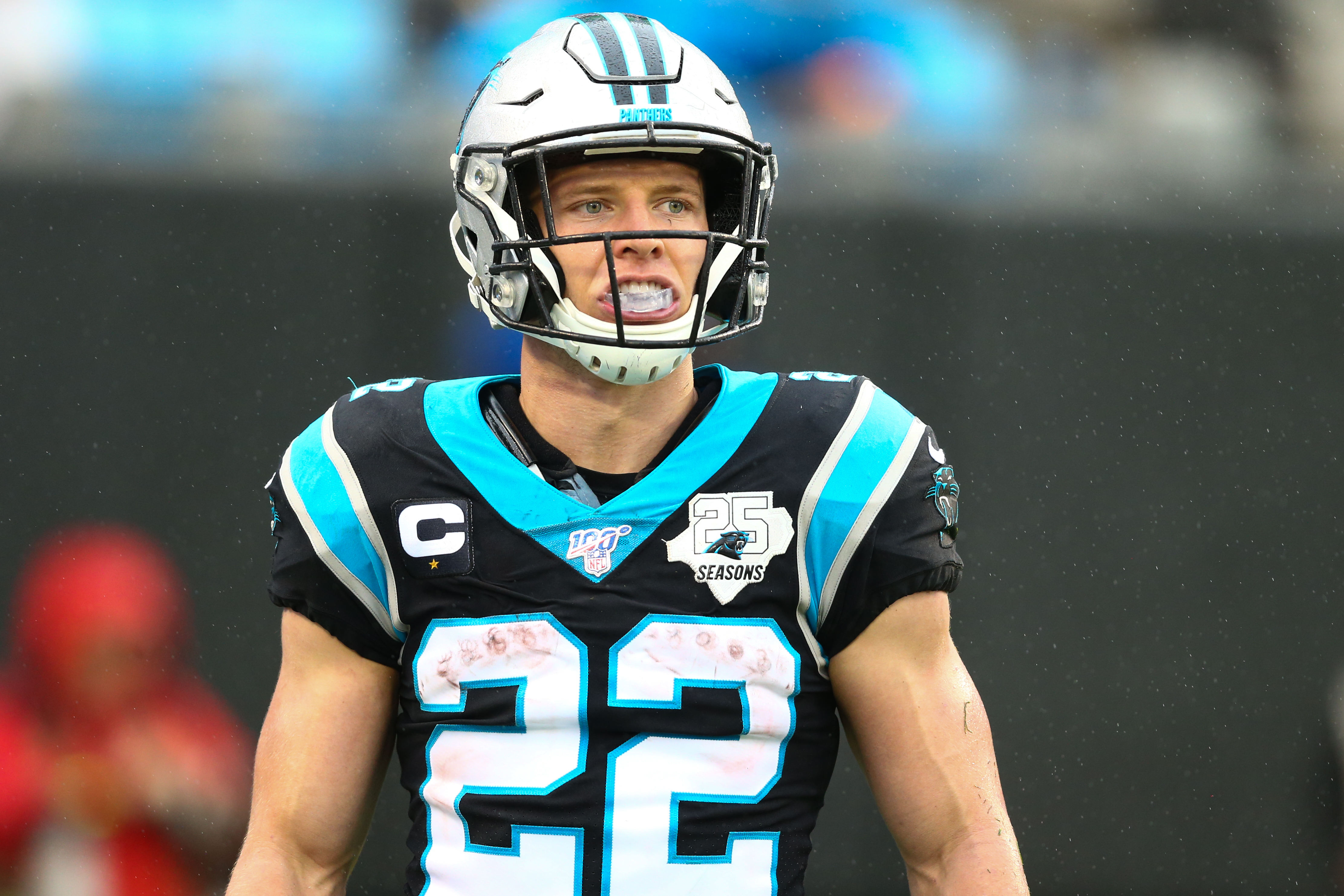 Carolina Panthers running back Christian McCaffrey (22) looks on from the field during the third quarter against the New Orleans Saints at Bank of America Stadium.