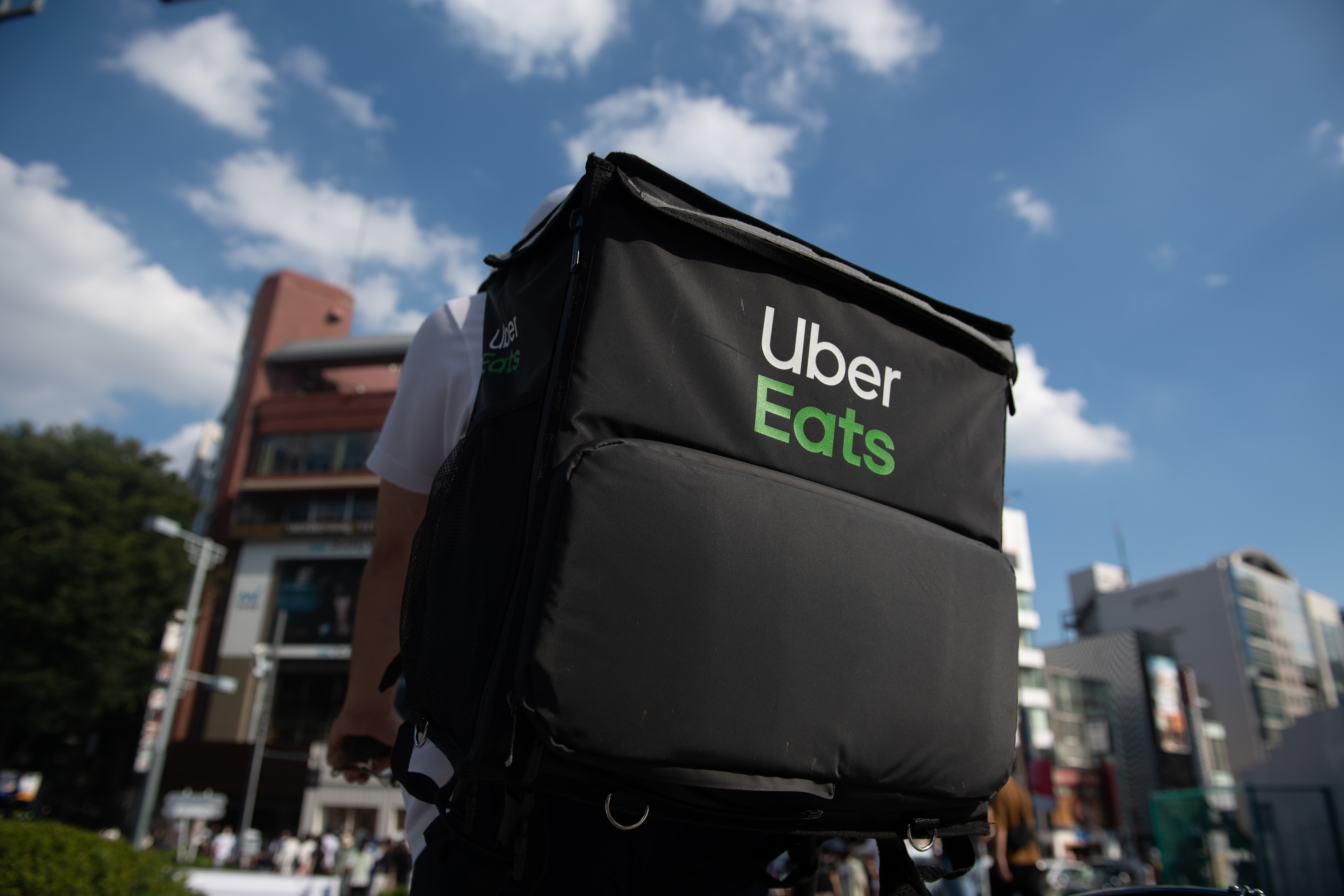 Uber Japan Couriers As Olympic Games Boost Foot-delivery Operators