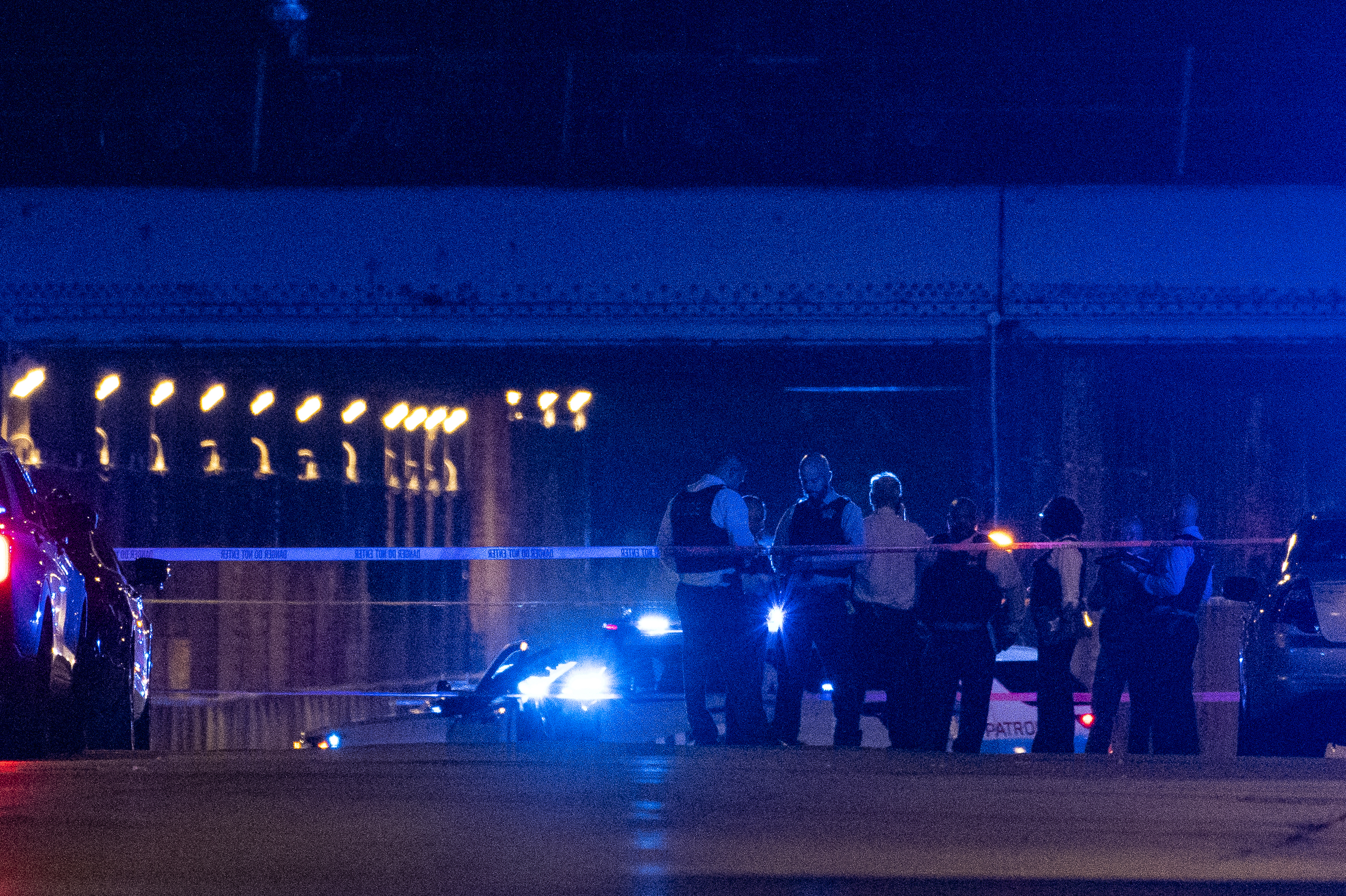 Chicago police work the scene where two police officers where shot during a traffic stop in the 6300 block of South Bell in West Englewood on Saturday, Aug. 7, 2021.