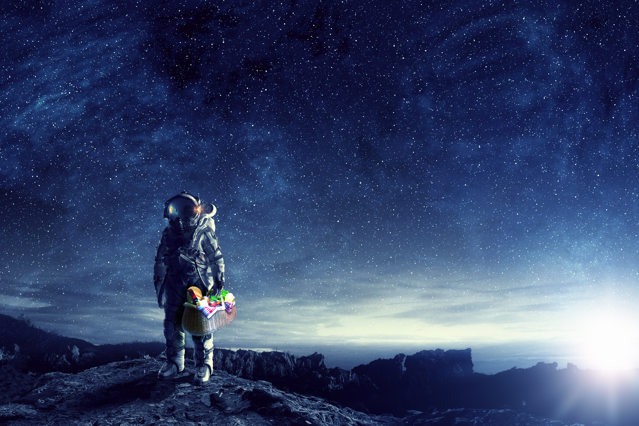 An illustration of an astronaut carrying a picnic basket on a barren planetary landscape with a sky full of stars.