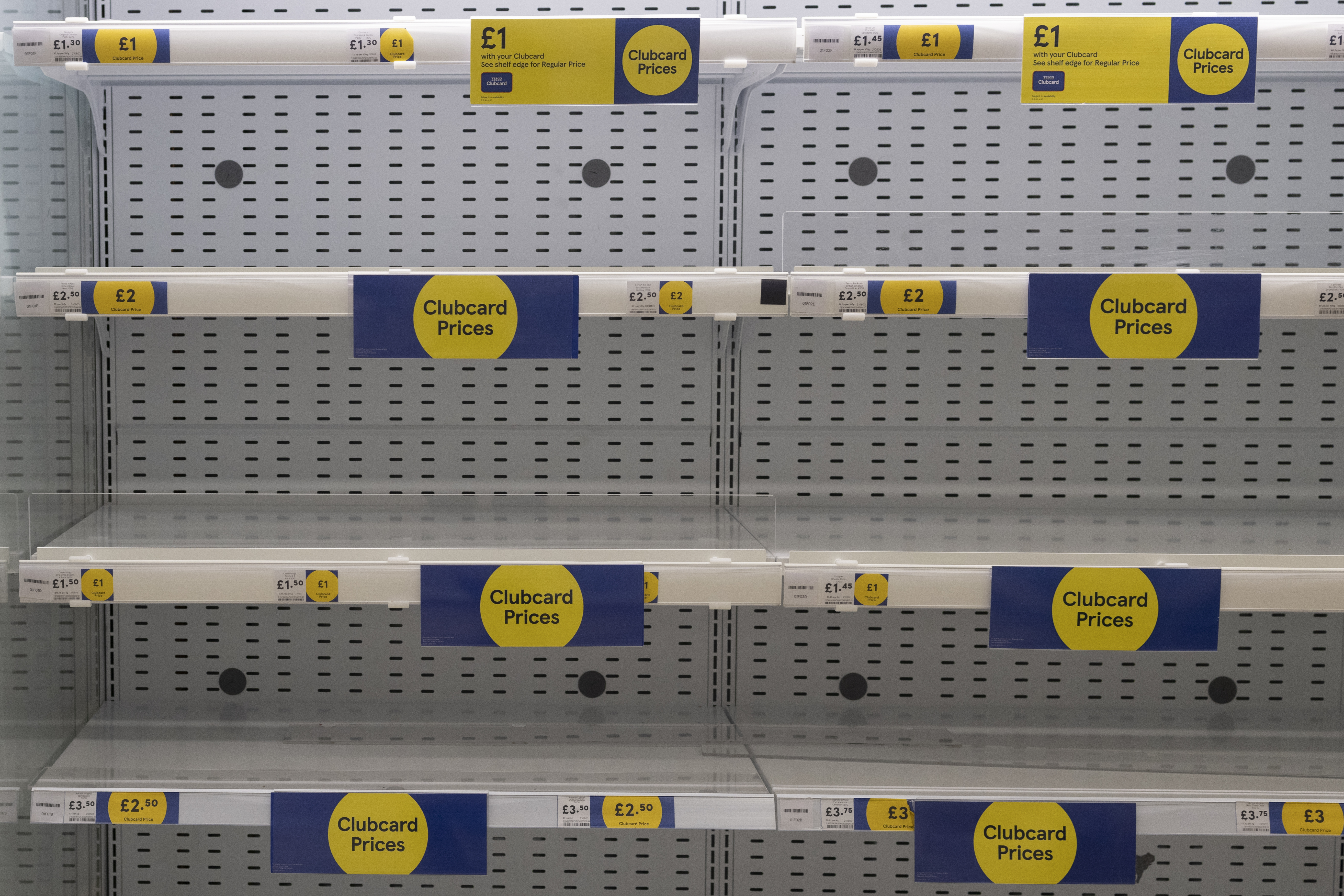 Empty supermarket shelves at Tesco, caused by Brexit and Covid-19 supply chain disruption