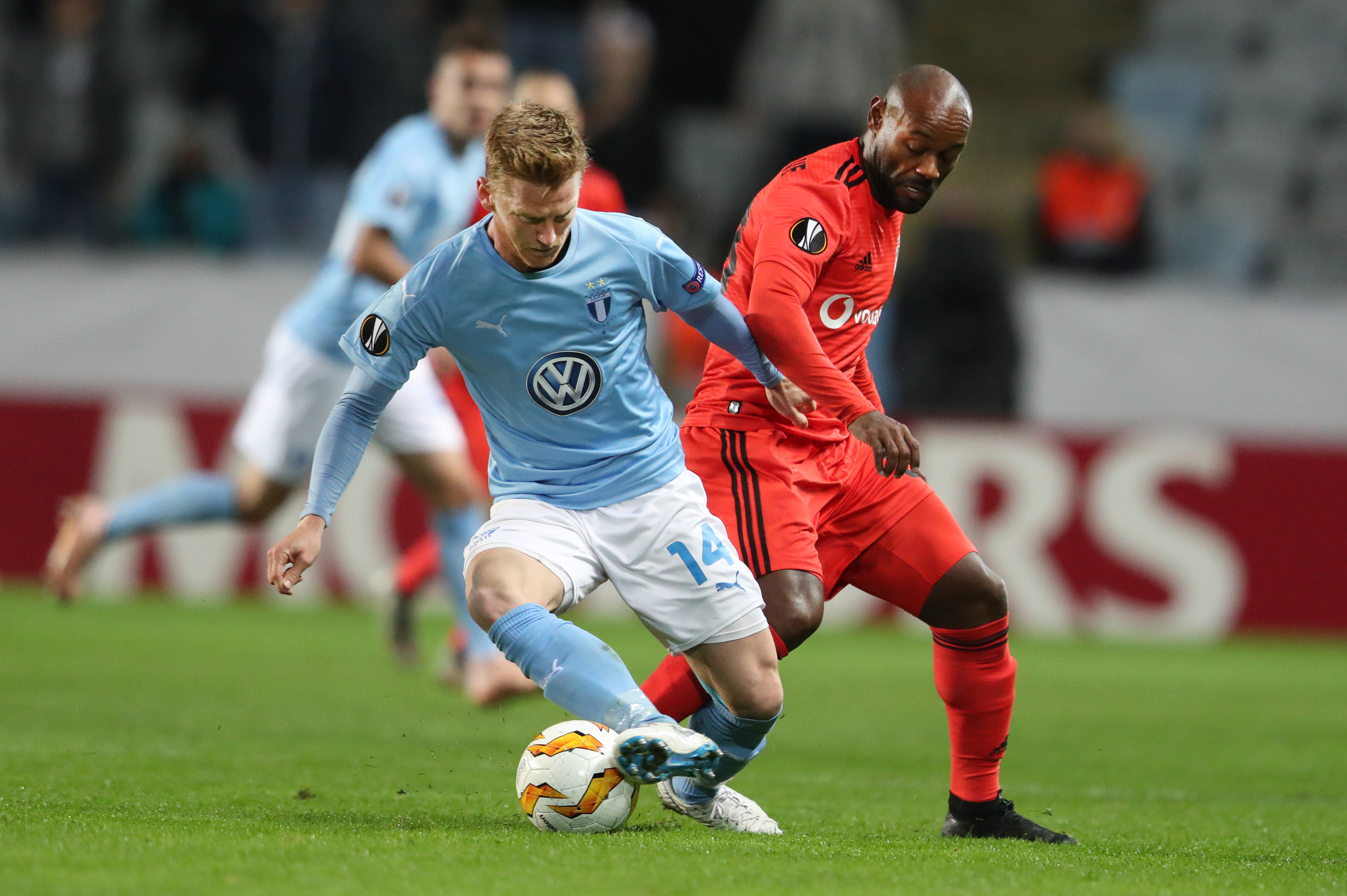 Anders Christiansen takes the ball from Besikta’s Vagner Love - Malmo - Champions League
