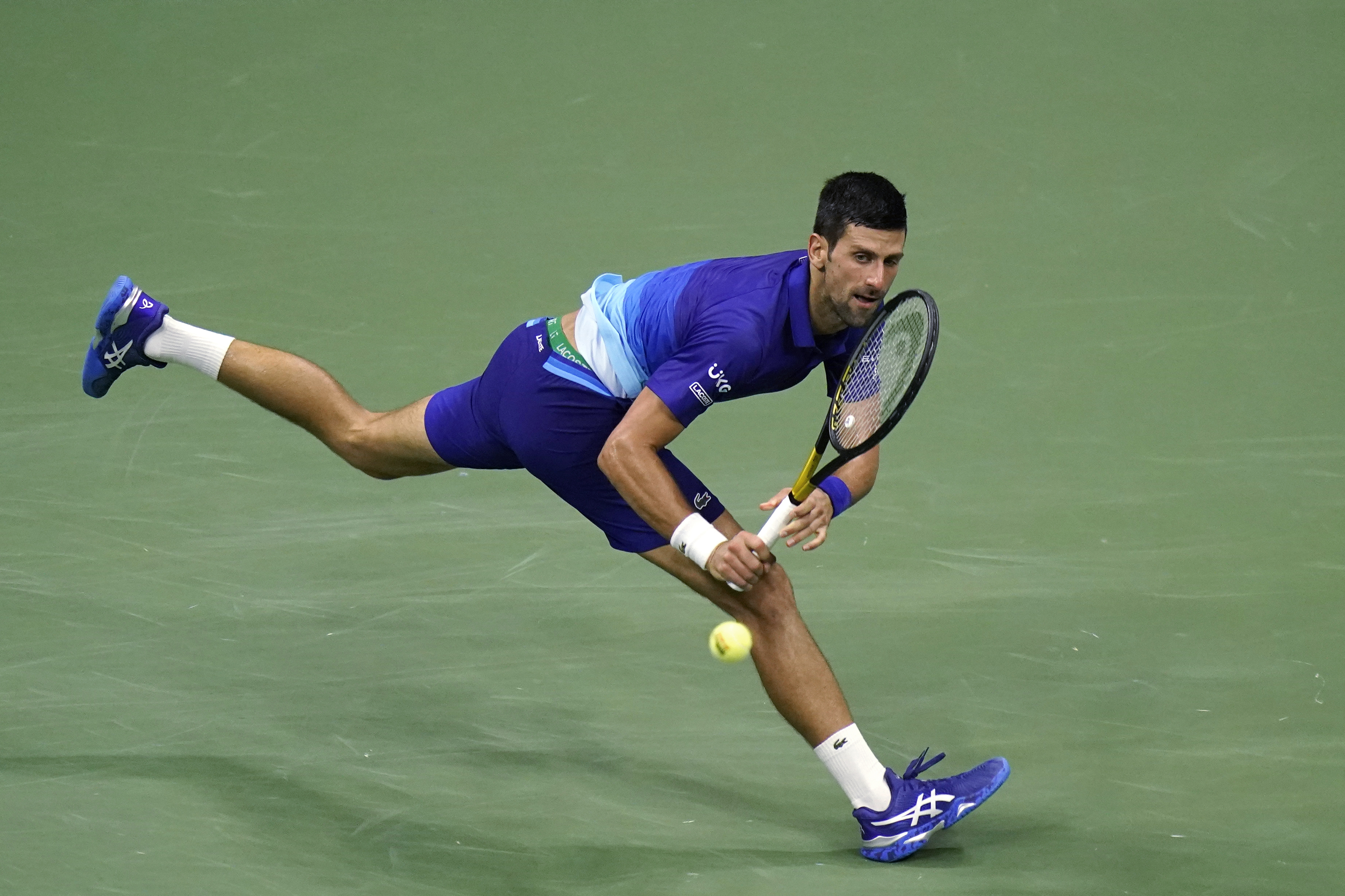 Novak Djokovic, of Serbia, watches a return to Matteo Berrettini, of Italy, during the U.S. Open quarterfinals.
