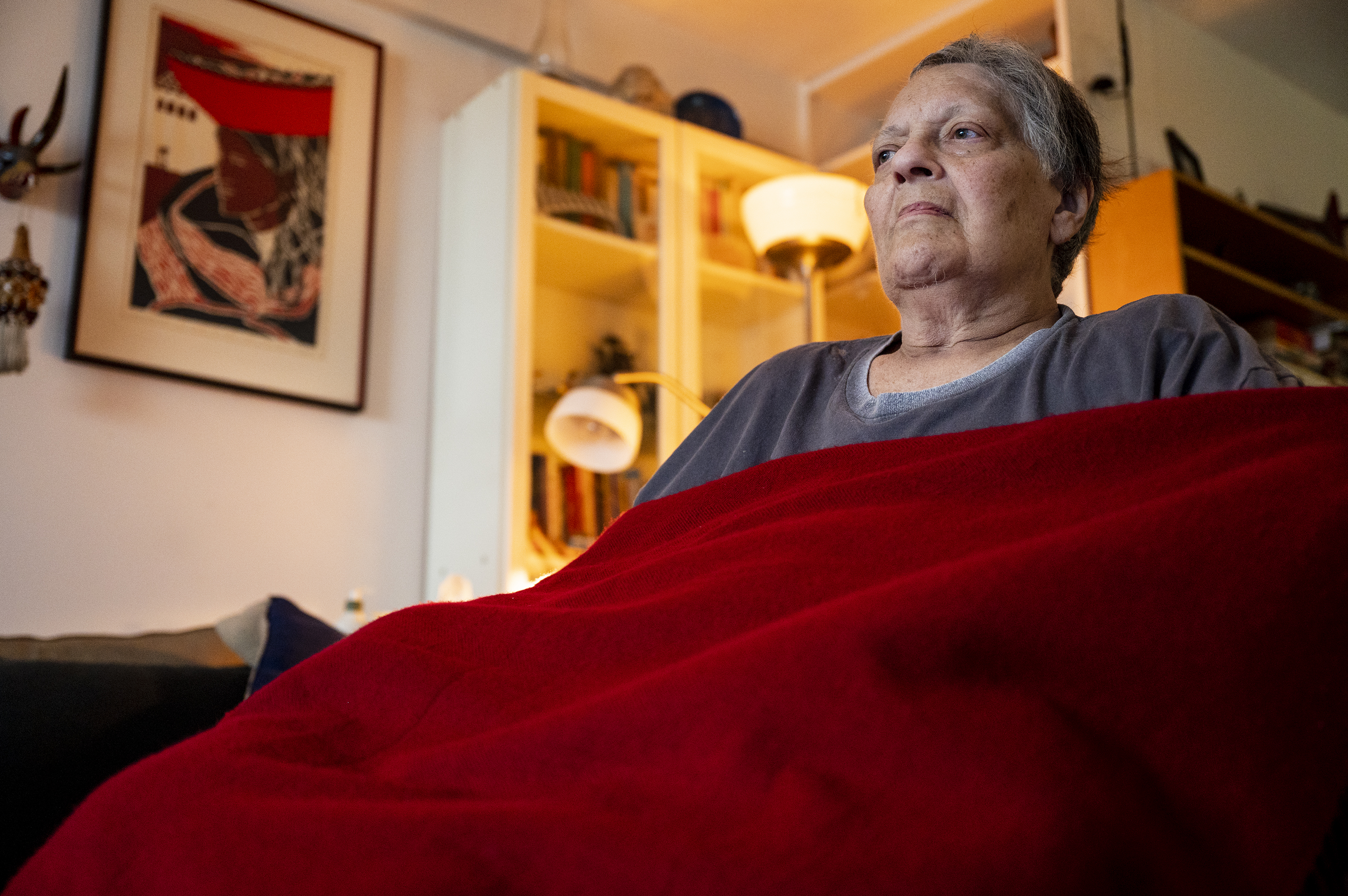 Roberta Singer sits inher Southbridge Towers apartment in Downtown Manhattan after being discharged from VillageCare.