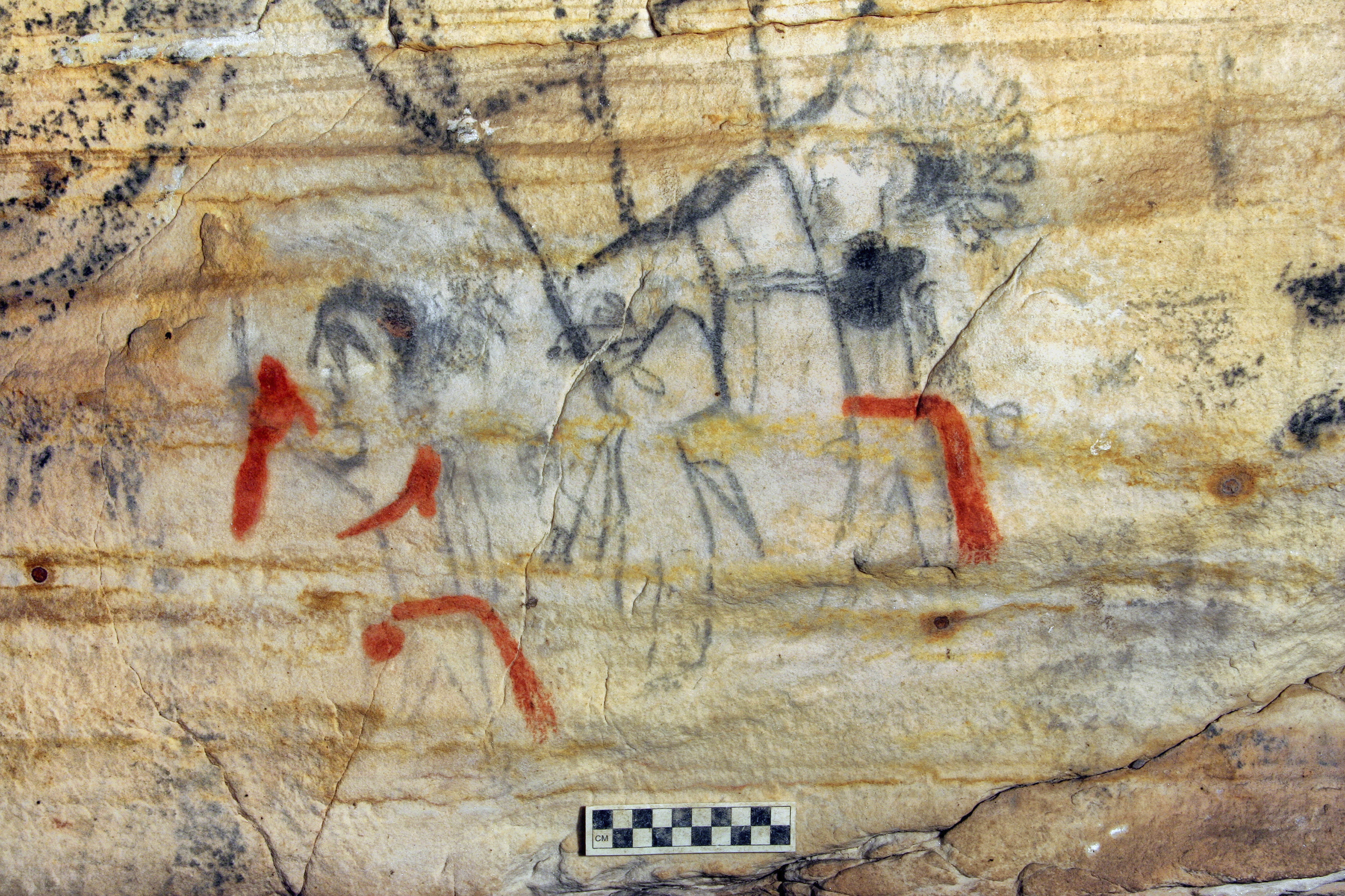 This photo shows a Missouri cave featuring artwork from the Osage Nation that’s more than 1,000 years old. The cave was sold at auction. The art inside “Picture Cave” shows humans, animals and mythical creatures. Experts who have studied the cave were concerned about the auction, but the director of the auction company says protections are in place to prohibit the new buyer from exploiting the cave, including a Missouri law that makes doing so a crime.