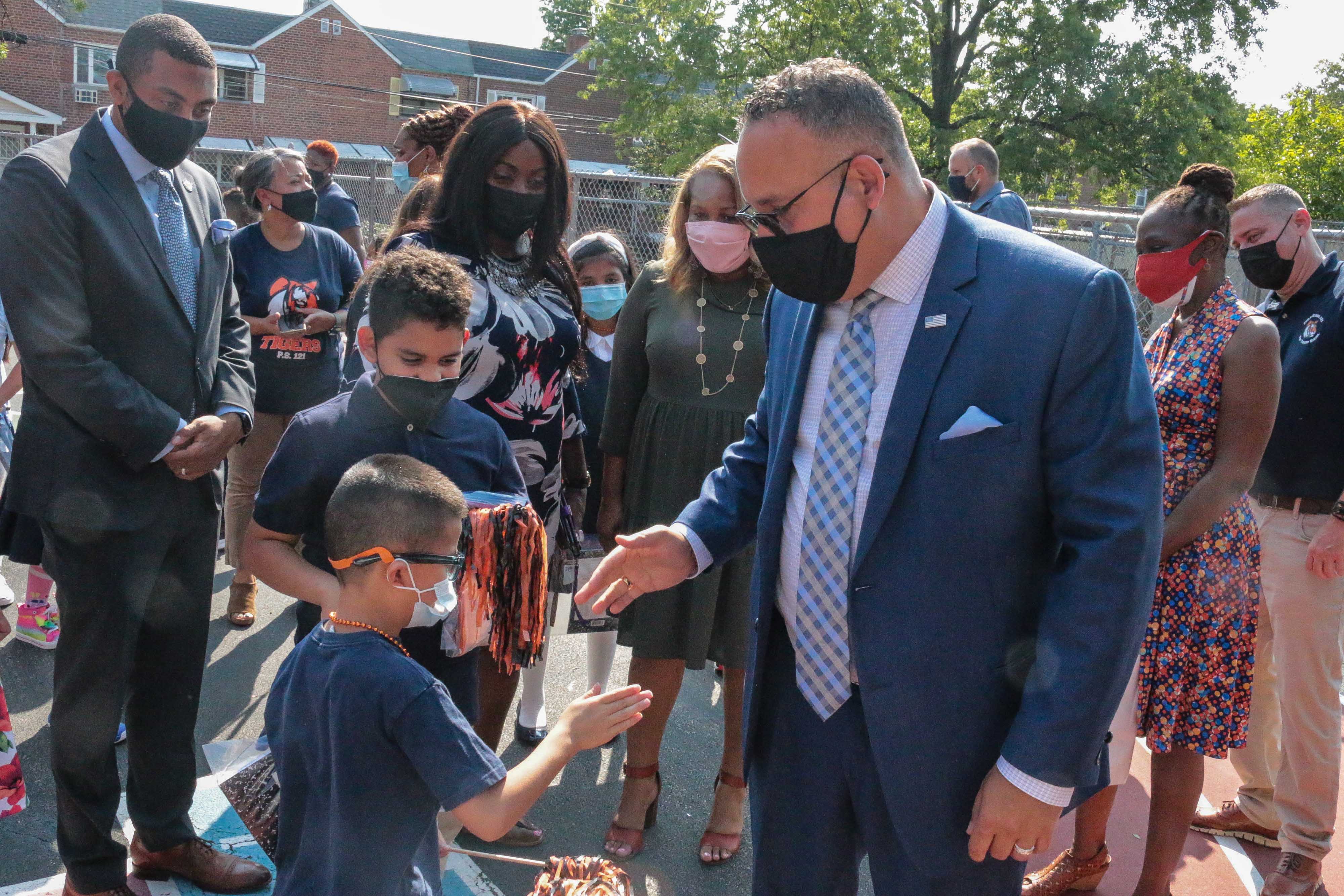 U.S. Secretary of Education Miguel Cardona meets with students on the first day of school at P.S. 121 in the Bronx.