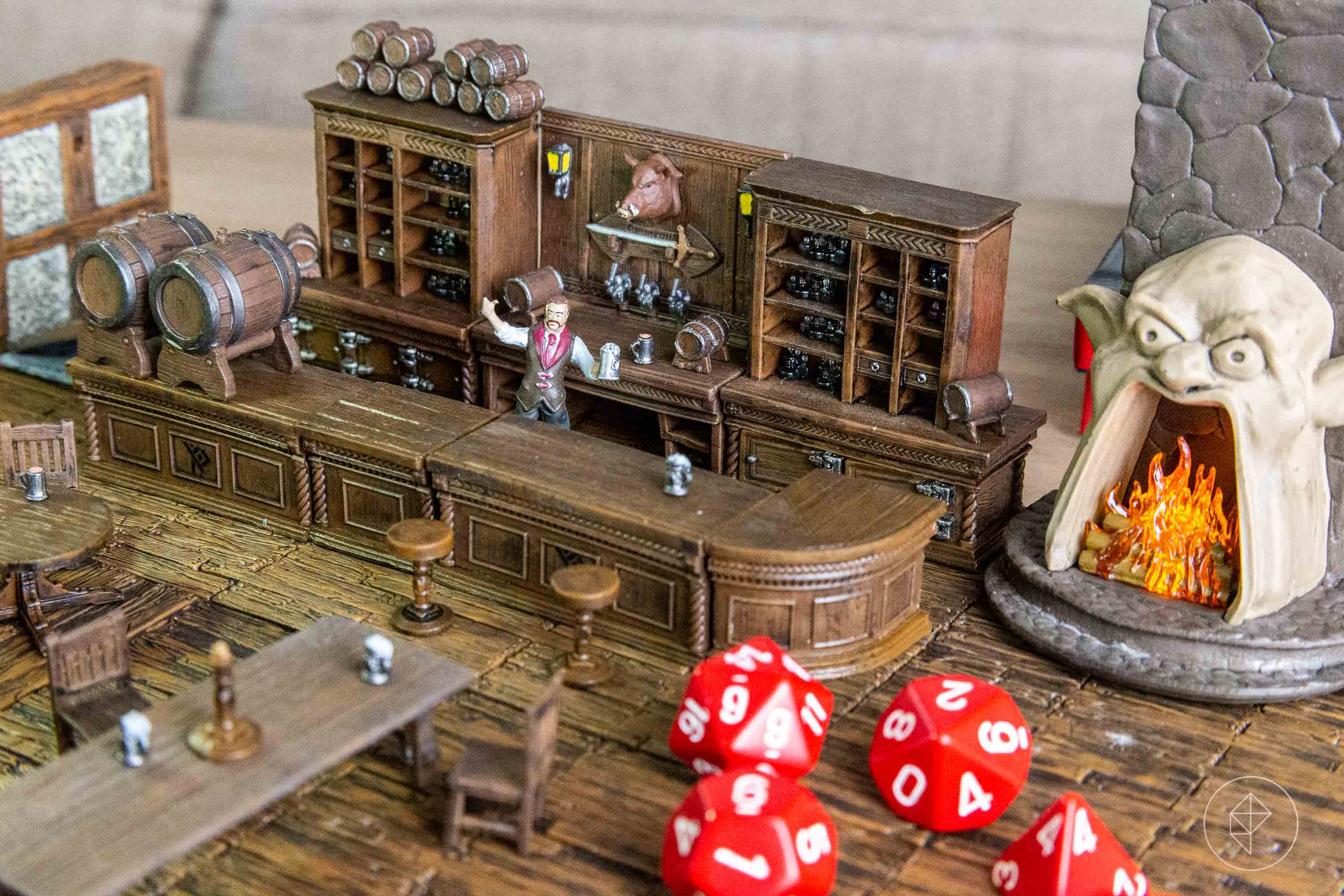 The corner bar at The Yawning Portal, complete with proprietor Durnan and a light-up hearth.