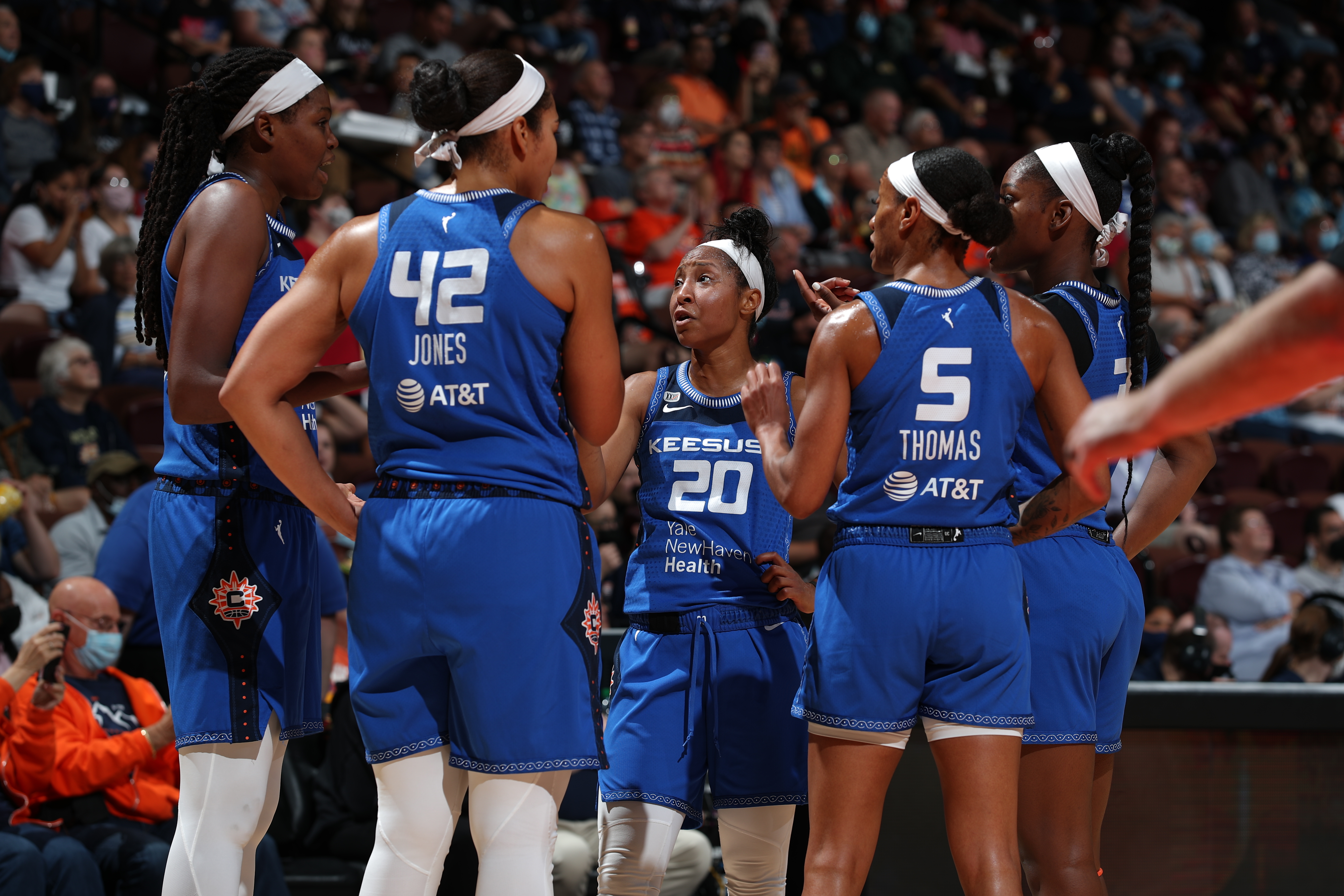 The Connecticut Sun huddle up during the game against the Atlanta Dream on September 19, 2021 at the Mohegan Sun Arena in Uncasville, Connecticut.