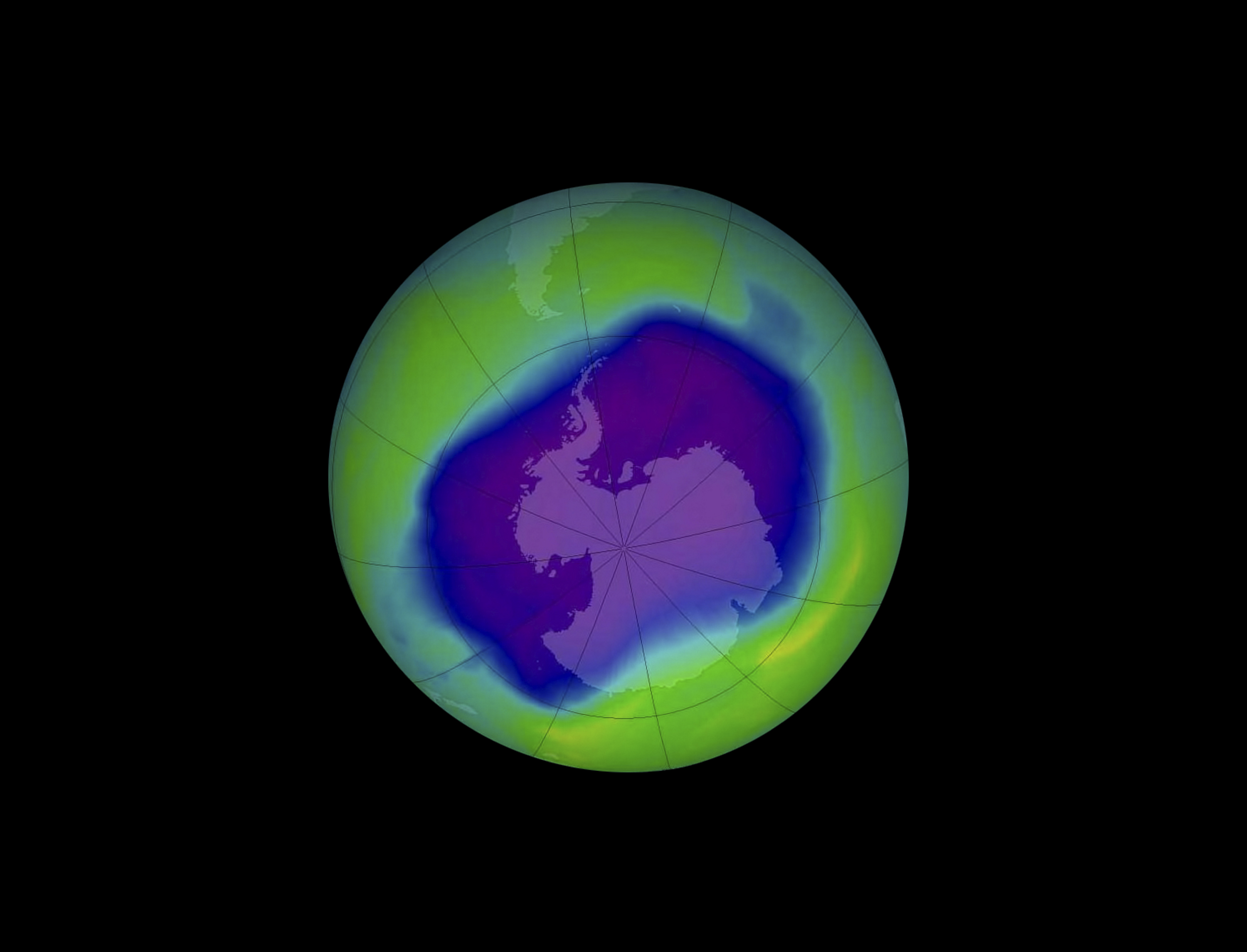 A view of planet Earth showing a purple blotch over the Antarctic representing a hole in the ozone layer of the atmosphere.
