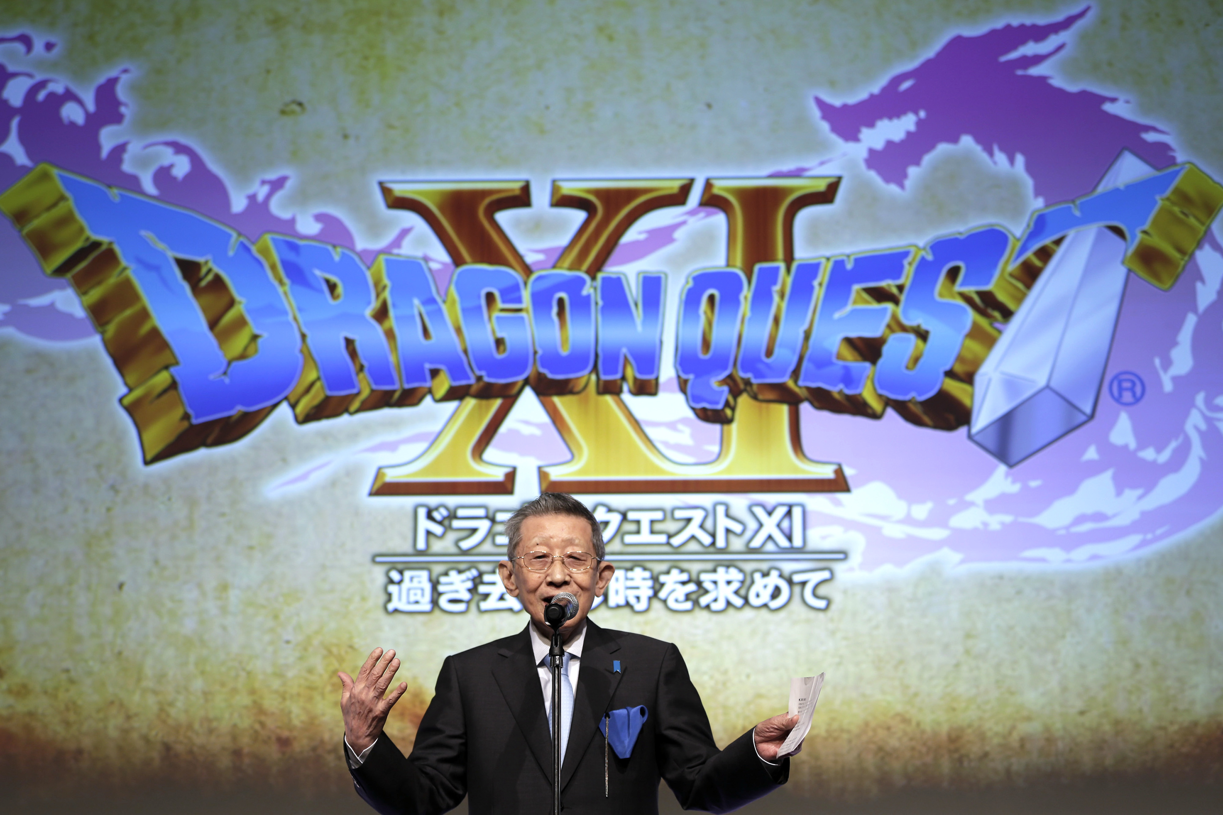 Koichi Sugiyama speaks during the unveiling of Dragon Quest 11 in Tokyo, Japan in 2015