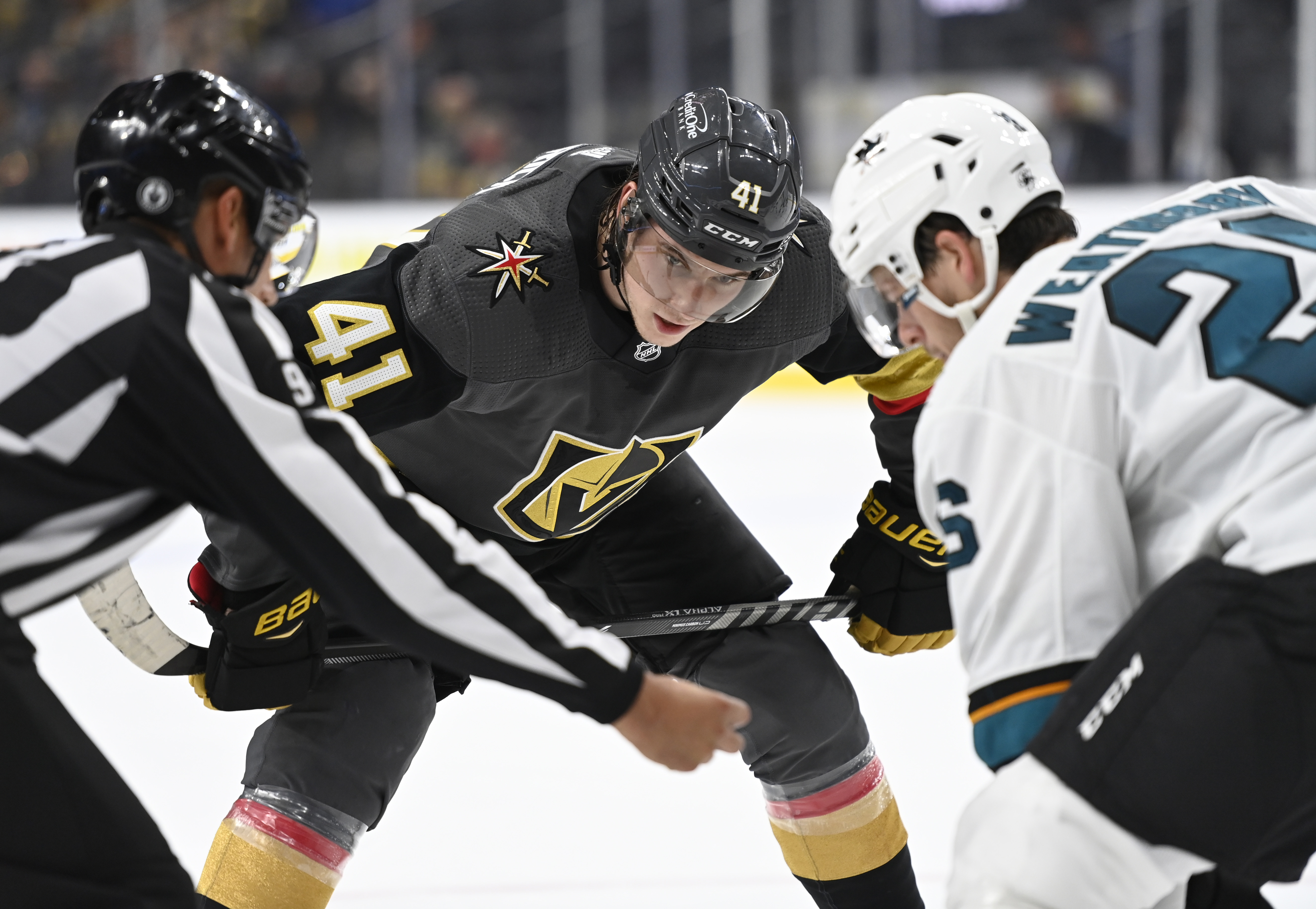 Nolan Patrick #41 of the Vegas Golden Knights faces off with Jasper Weatherby #26 of the San Jose Sharks during the third period at T-Mobile Arena on September 26, 2021 in Las Vegas, Nevada.