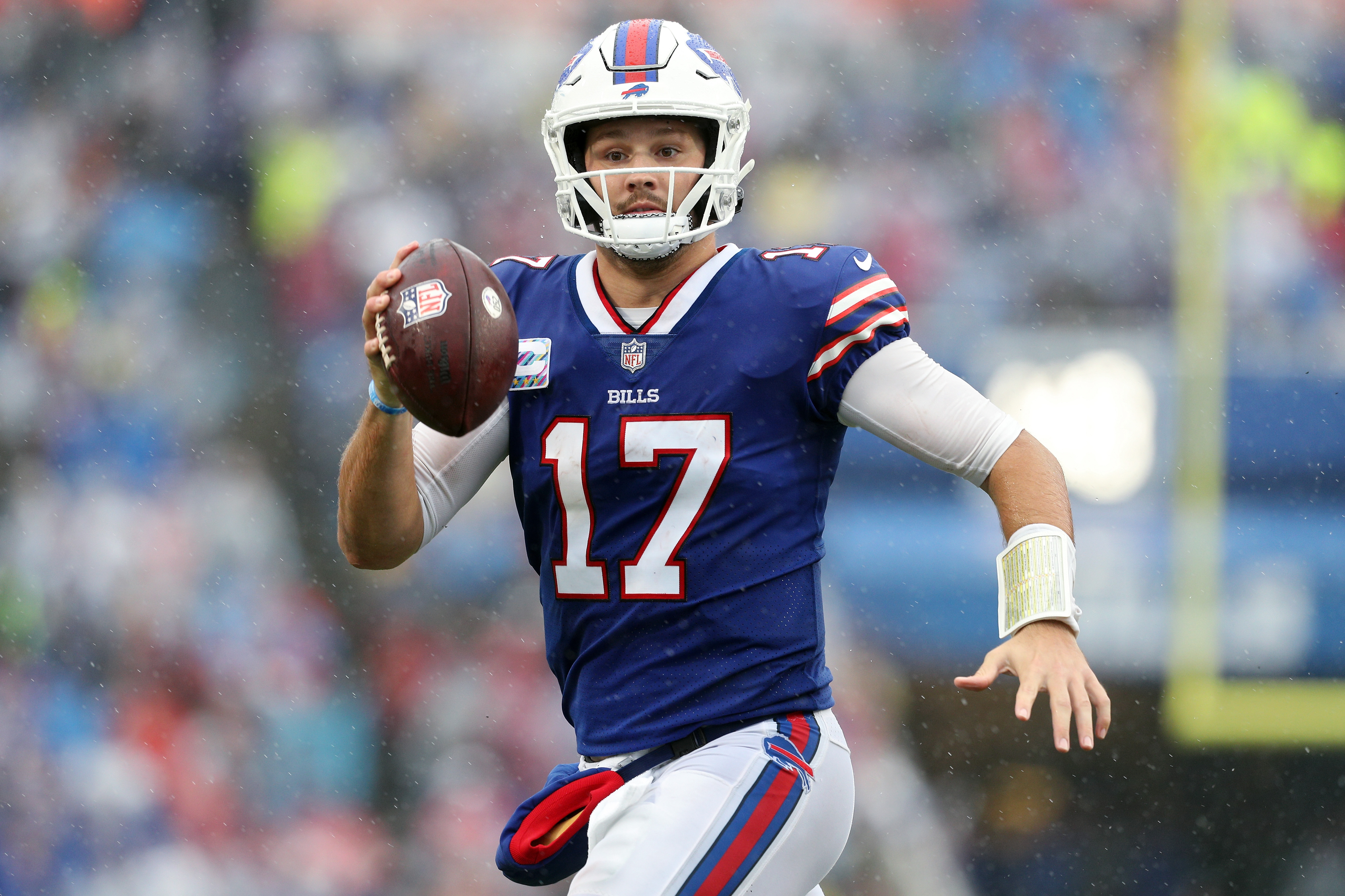 Quarterback Josh Allen #17 of the Buffalo Bills looks to pass against the Houston Texans in the fourth quarter at Highmark Stadium on October 03, 2021 in Orchard Park, New York.