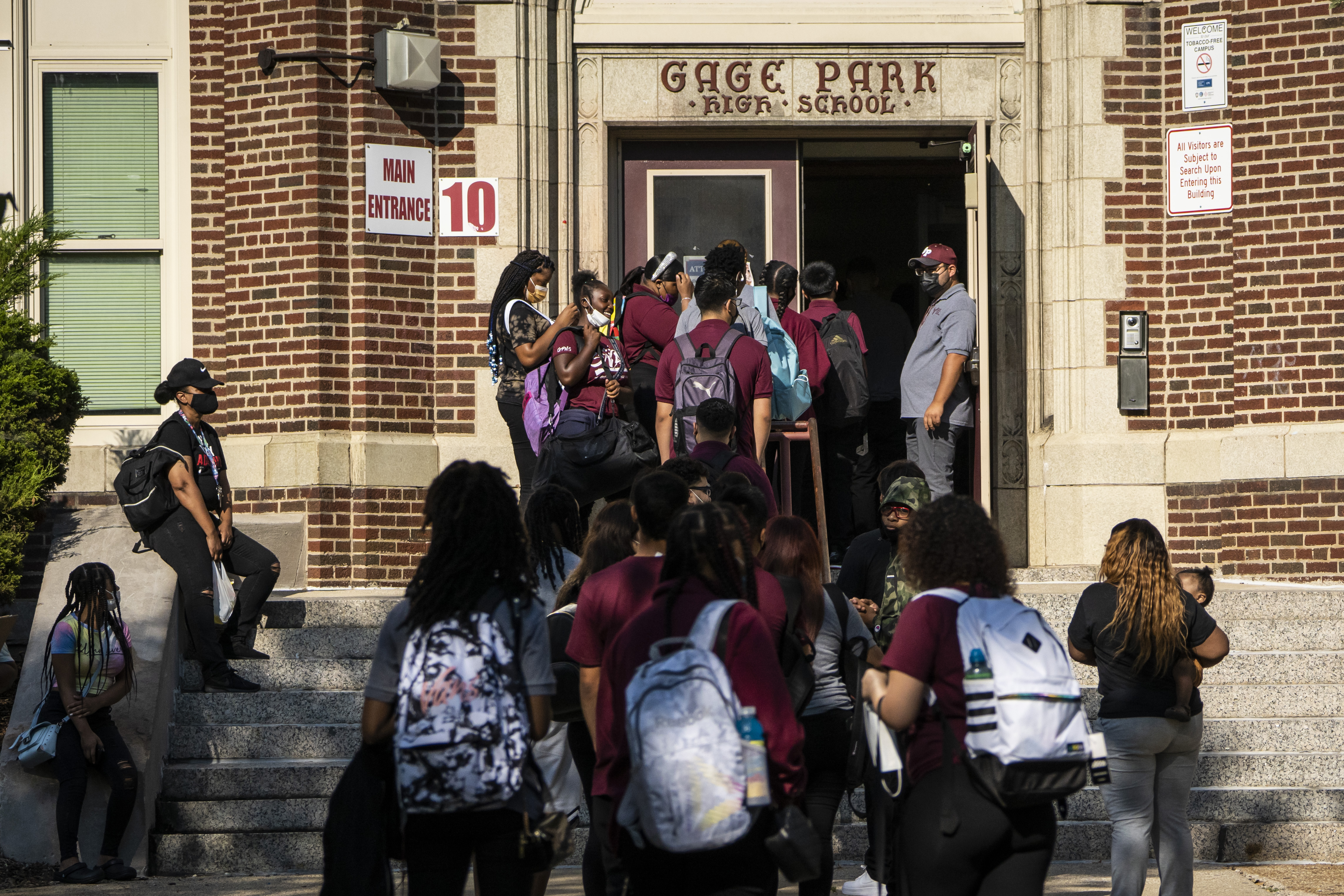 Students arrive at Gage Park High School, 5630 S. Rockwell St. in Gage Park, for the first day of school for the Chicago Public Schools 2021 - 2022 school year, Monday morning, Aug. 30, 2021. 