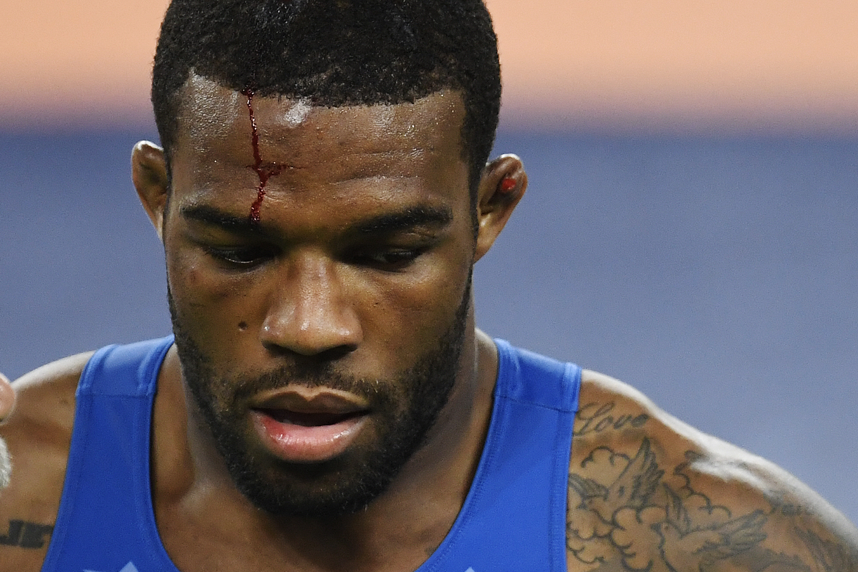 Jordan Burroughs draws blood during a 2016 wrestling tournament in Brazil. 