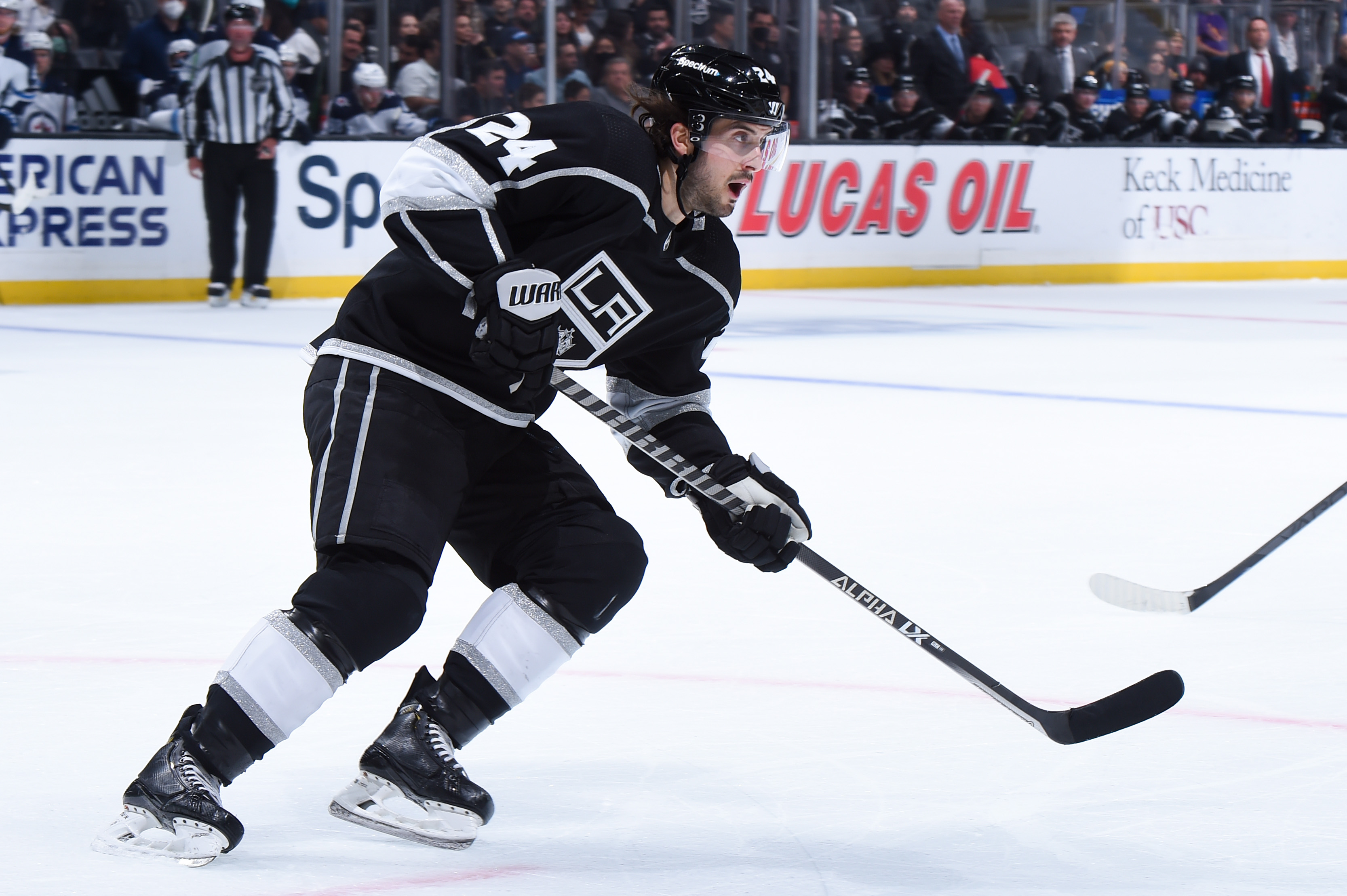 Phillip Danault #24 of the Los Angeles Kings skates on the ice during the second period against the Winnipeg Jets at STAPLES Center on October 28, 2021 in Los Angeles, California.