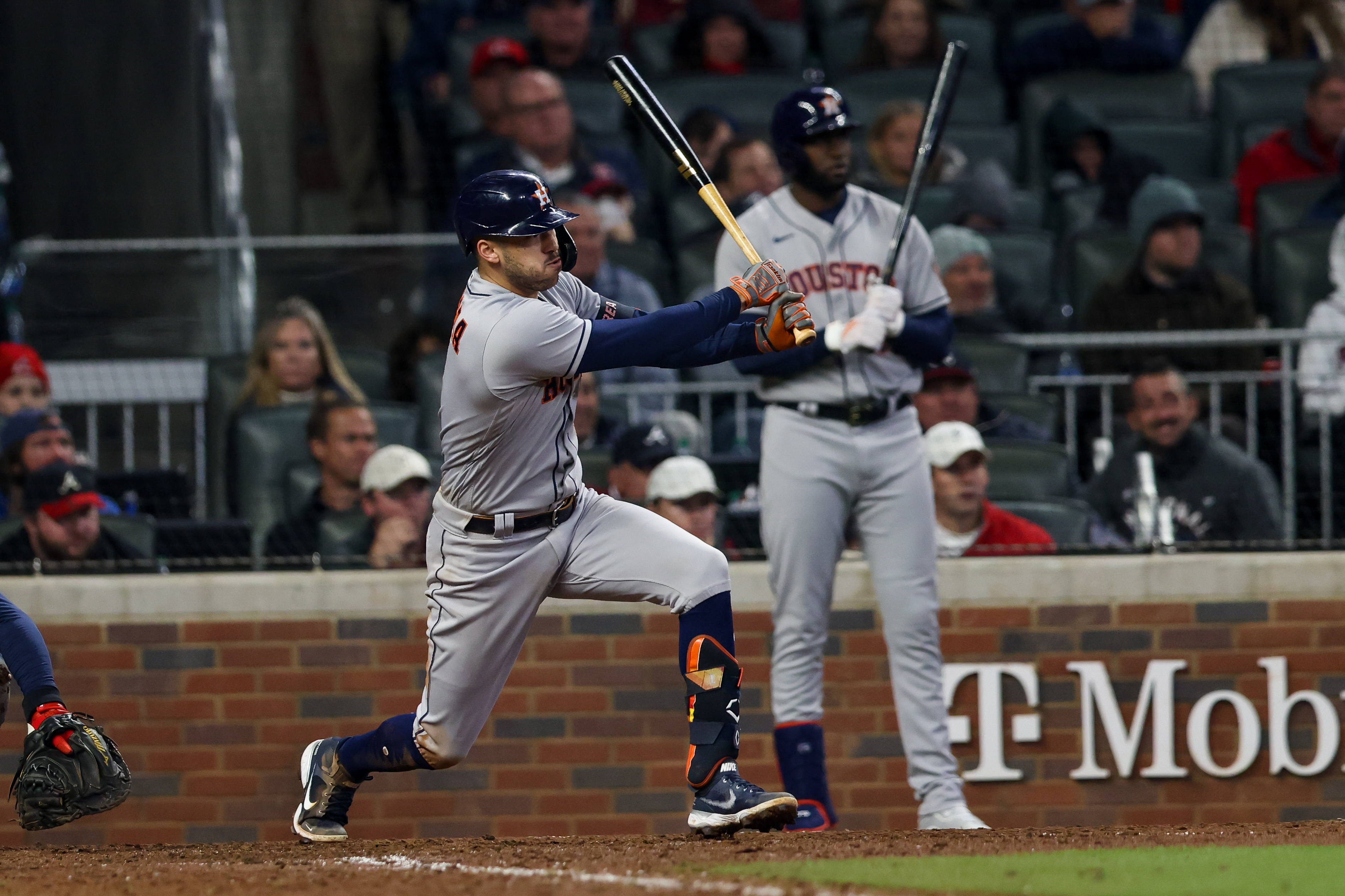 Carlos Correa #1 of the Houston Astros hits a RBI single in the eighth inning during Game 5 of the 2021 World Series between the Houston Astros and the Atlanta Braves at Truist Park on Sunday, October 31, 2021 in Atlanta, Georgia.