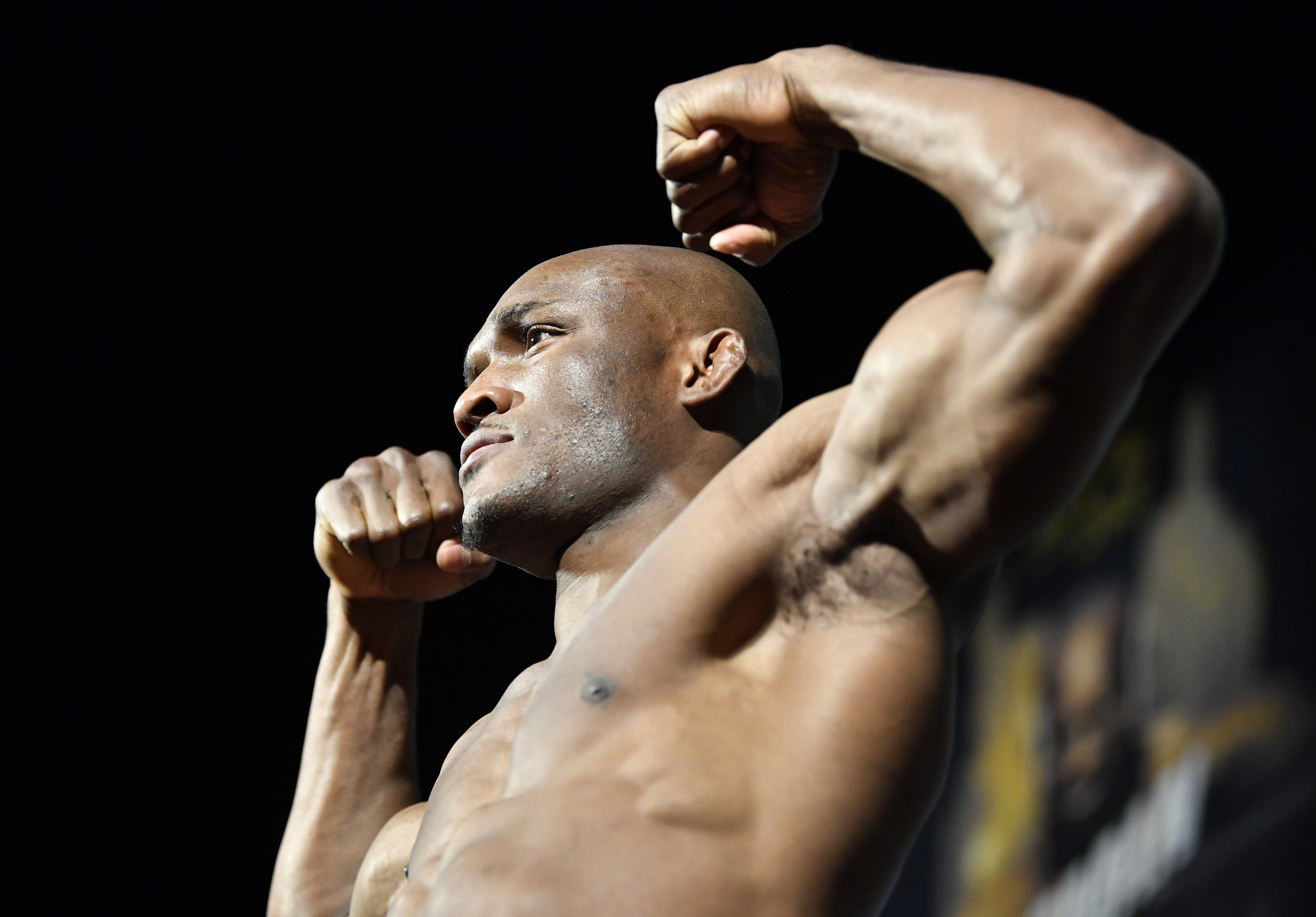 Kamaru Usman of Nigeria poses on the scale during the UFC 268 ceremonial weigh-in at The Hulu Theater at Madison Square Garden on November 05, 2021 in New York City.