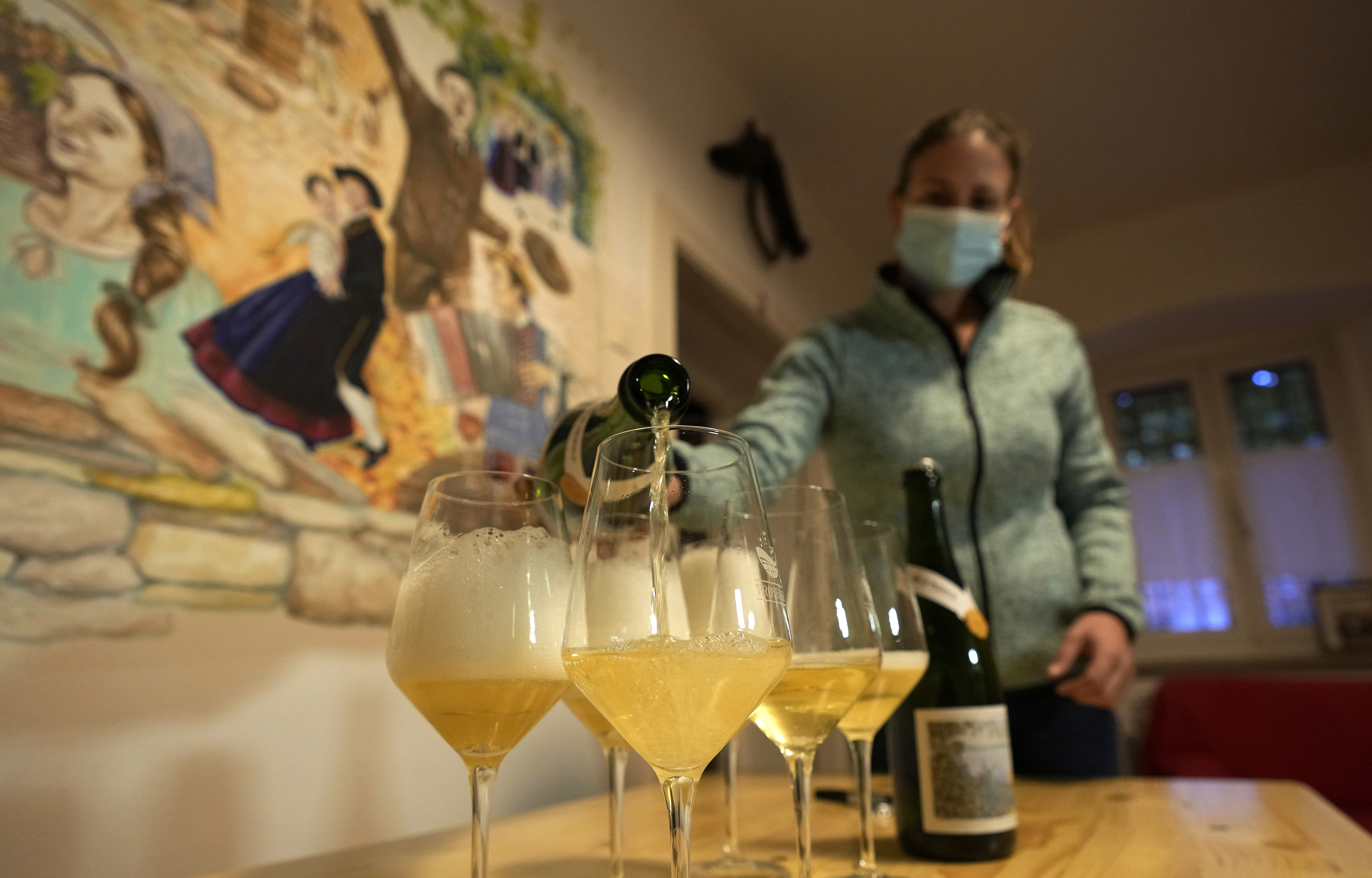 Winemaker Vesna Bukavec pours a Prosekar wine in Prosecco, near Trieste, Italy. Italy has pledged to defend the name of the popular sparkling wine Prosecco as Croatia petitions the European Union to allow its winemakers to call their sweet dessert wine Prosek.
