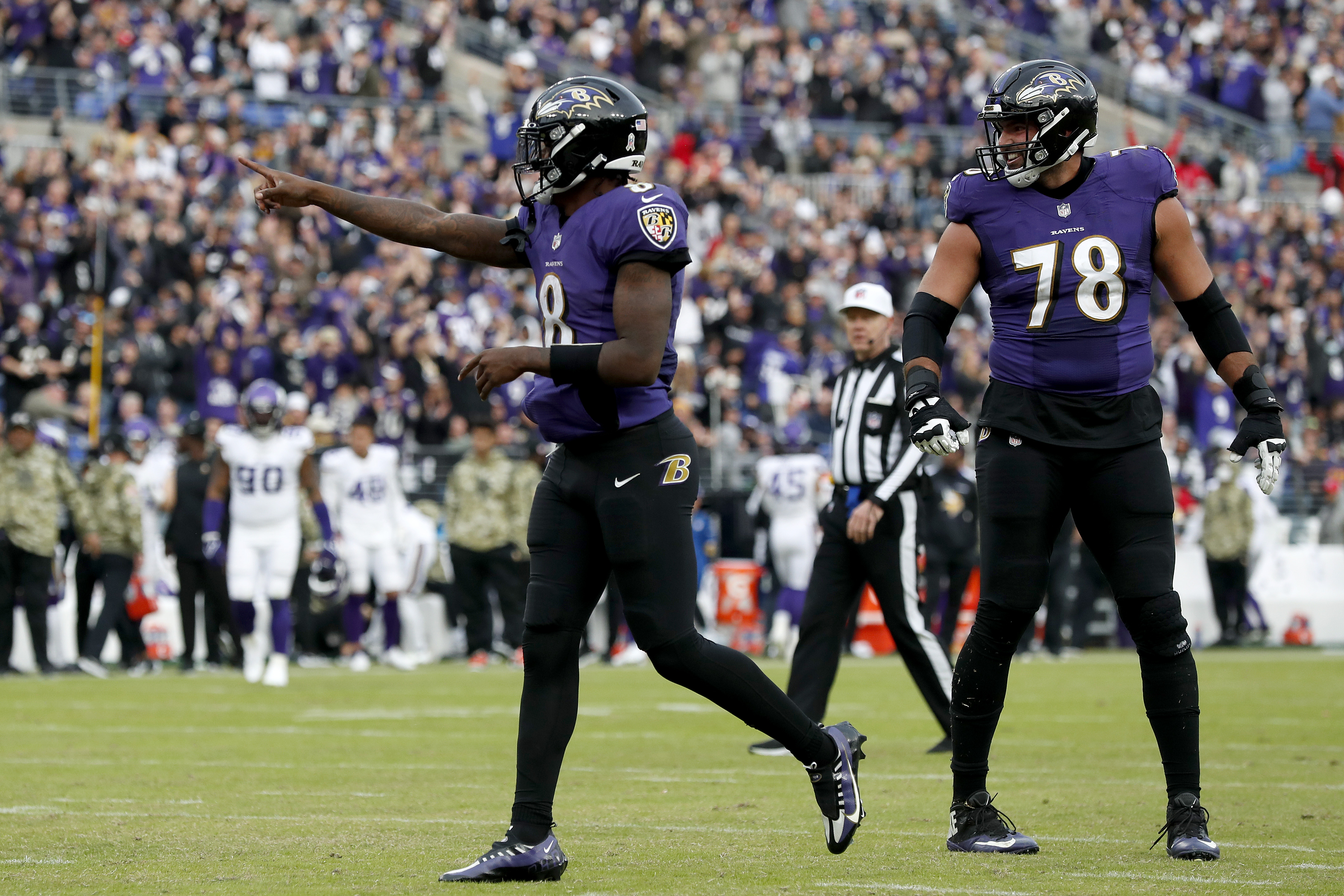 Lamar Jackson #8 of the Baltimore Ravens reacts after a fourth quarter touchdown against the Minnesota Vikings at M&amp;T Bank Stadium on November 07, 2021 in Baltimore, Maryland.