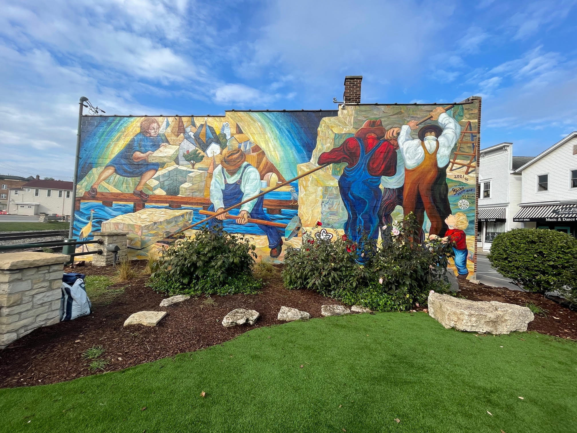 This mural, titled “Lemont Quarry Workers,” was painted in 1975 by Caryl Yasko when she was 34. She came back this year at 80 to again refurbish the mural honoring the southwest suburb’s limestone-cutting history.