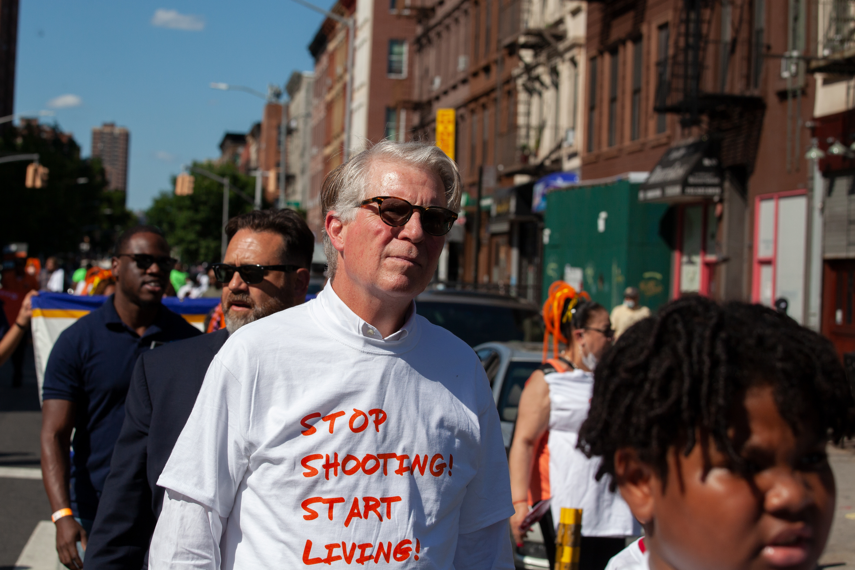 Manhattan District Attorney Cyrus Vance takes part in an anti-violence march through East Harlem, June 17, 2021.