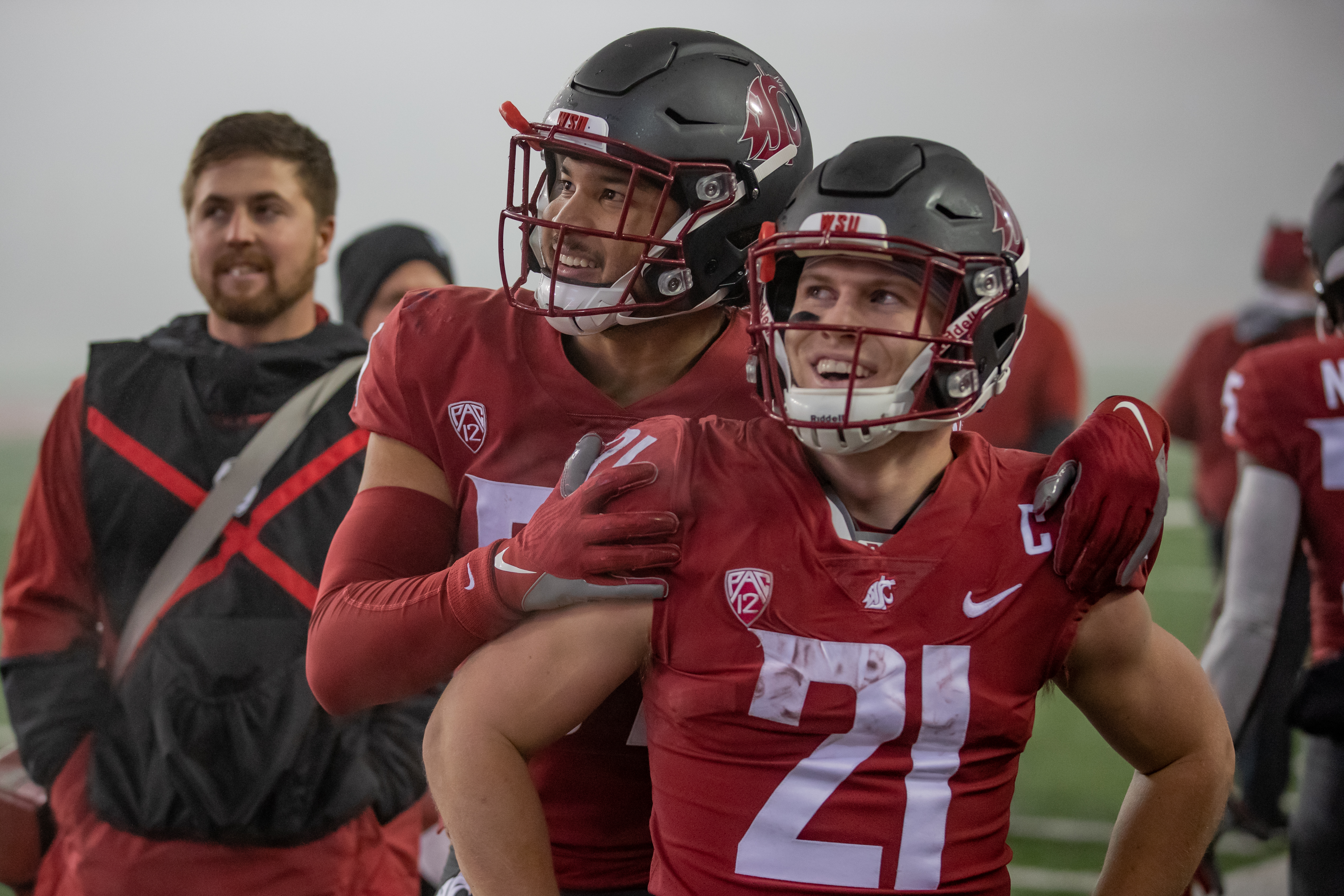 PULLMAN, WA - NOVEMBER 19: Washington State linebacker Justus Rogers (37) and running back Max Borghi (21) look at the score board during the second half of a PAC 12 conference matchup between the Arizona Wildcats and the Washington State Cougars on November 19, 2021, at Martin Stadium in Pullman, WA.