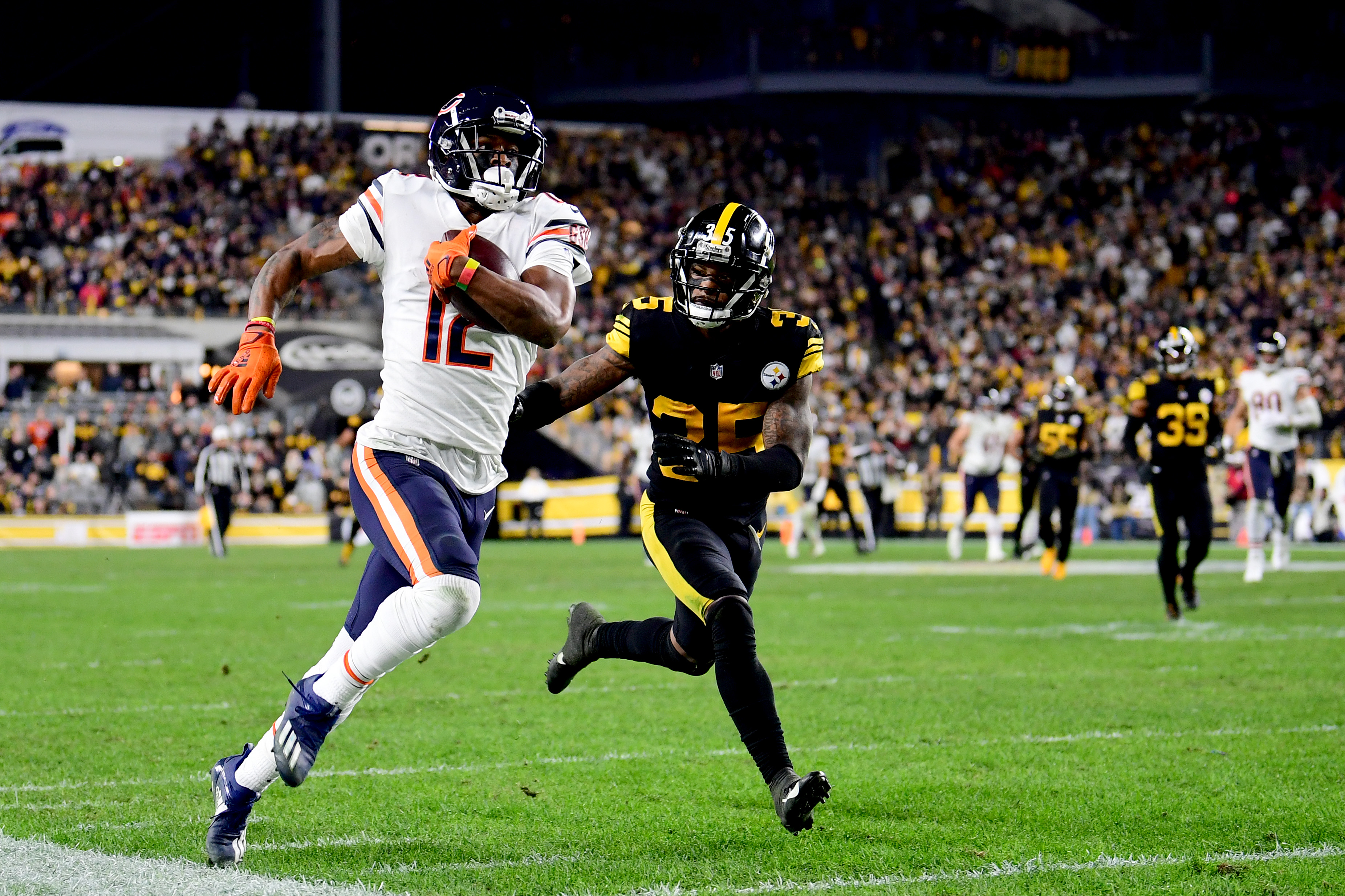 Allen Robinson #12 of the Chicago Bears carries the ball against Arthur Maulet #35 of the Pittsburgh Steelers during the second half of their game at Heinz Field on November 08, 2021 in Pittsburgh, Pennsylvania.