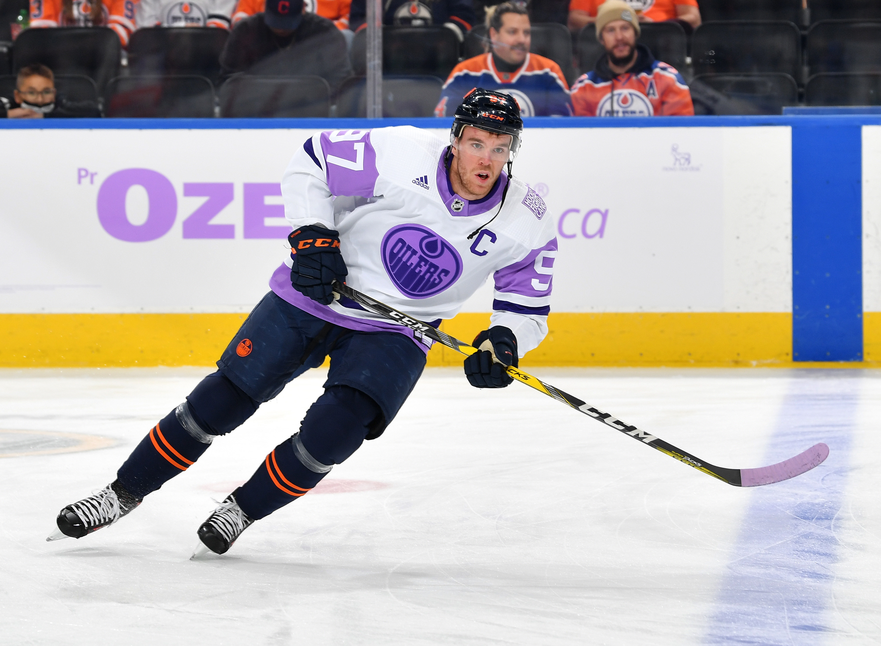 Connor McDavid #97 of the Edmonton Oilers skates during the pre-game skate wearing a Hockey Fights Cancer jersey before the game against the Chicago Blackhawks on November 20, 2021 at Rogers Place in Edmonton, Alberta, Canada.