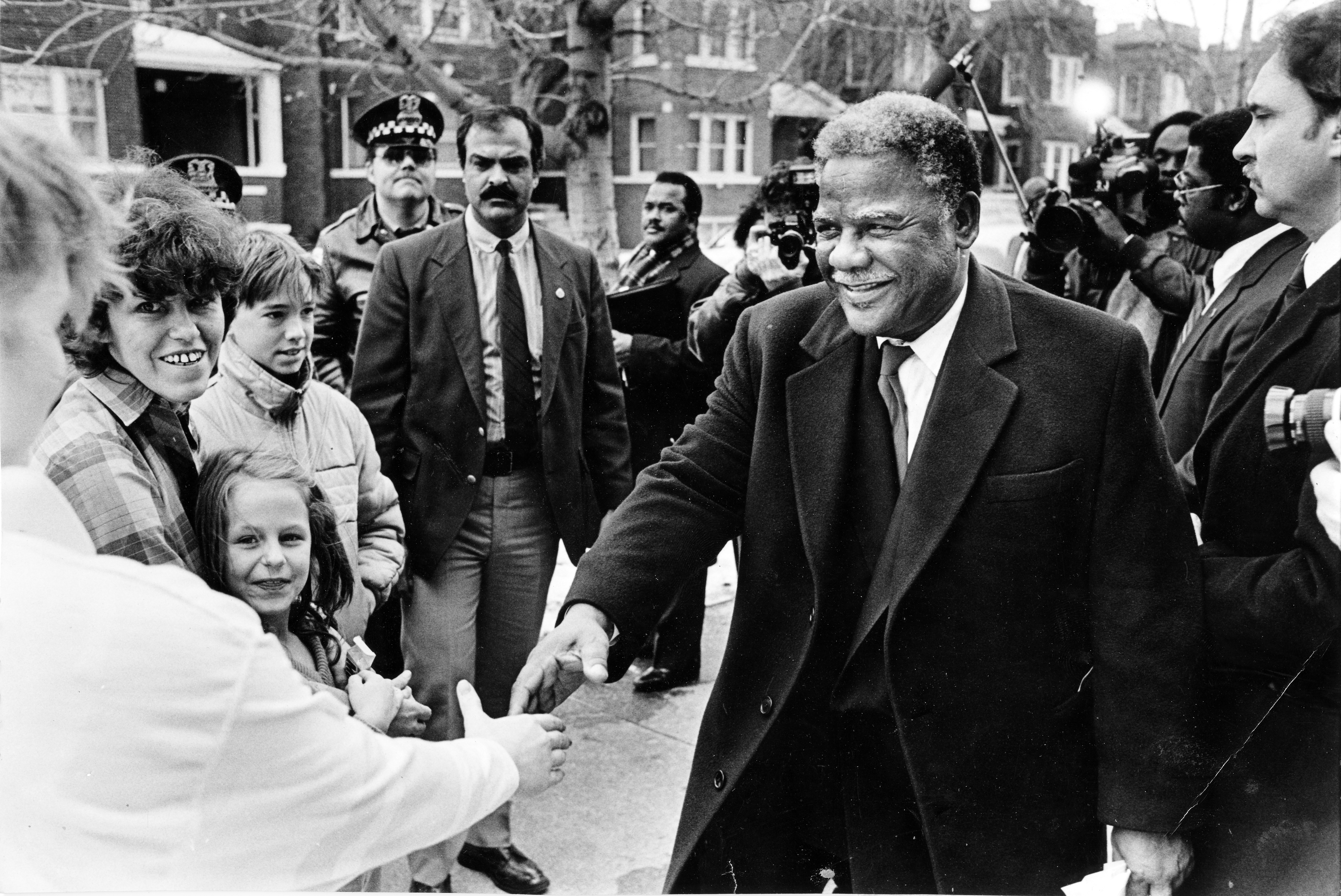 Mayor Harold Washington at Weber High School, where he greeted Chicagoans before a mayoral forum. 