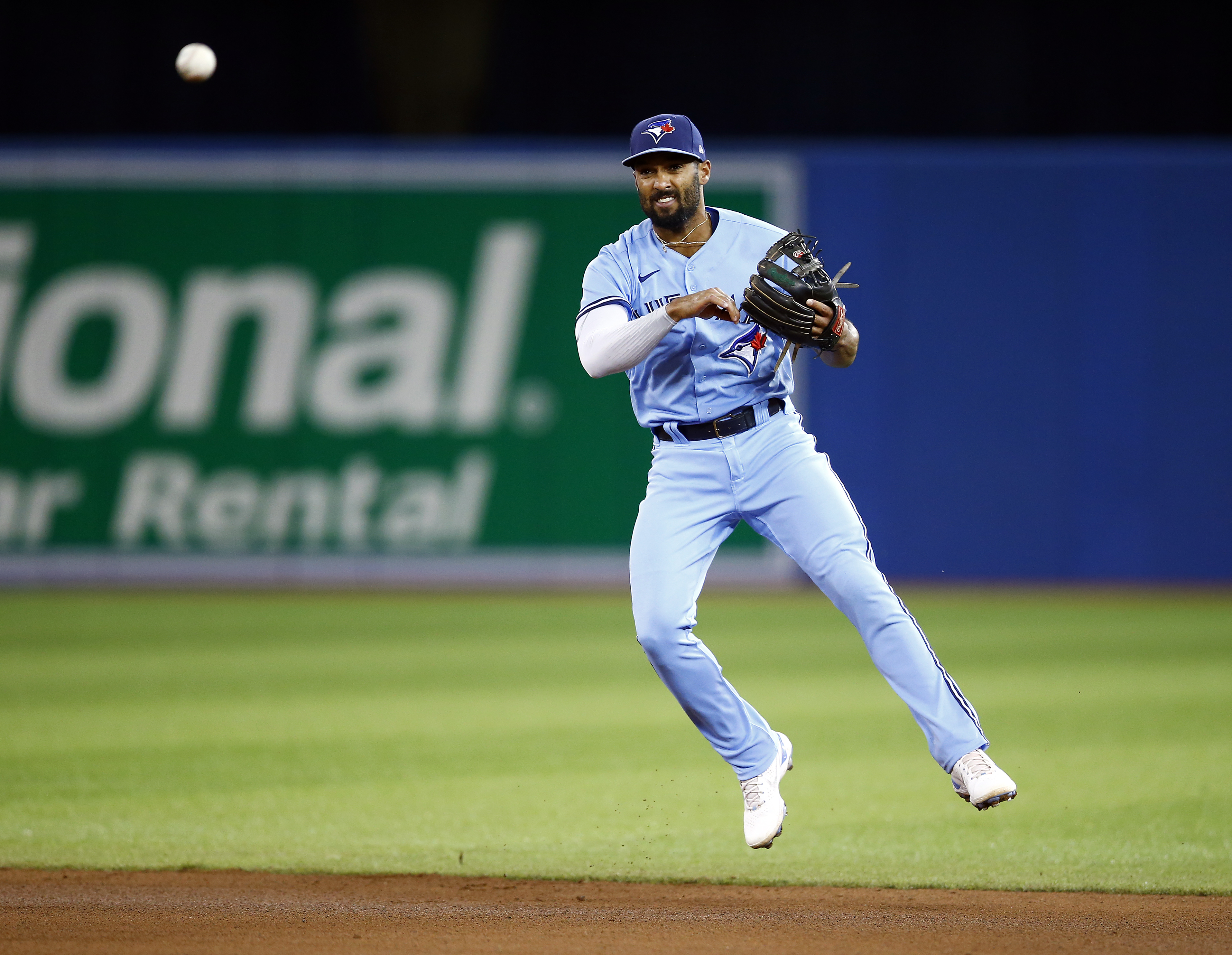 Marcus Semien #10 of the Toronto Blue Jays throws to first base during a MLB game against the New York Yankees at Rogers Centre on September 29, 2021 in Toronto, Ontario, Canada.